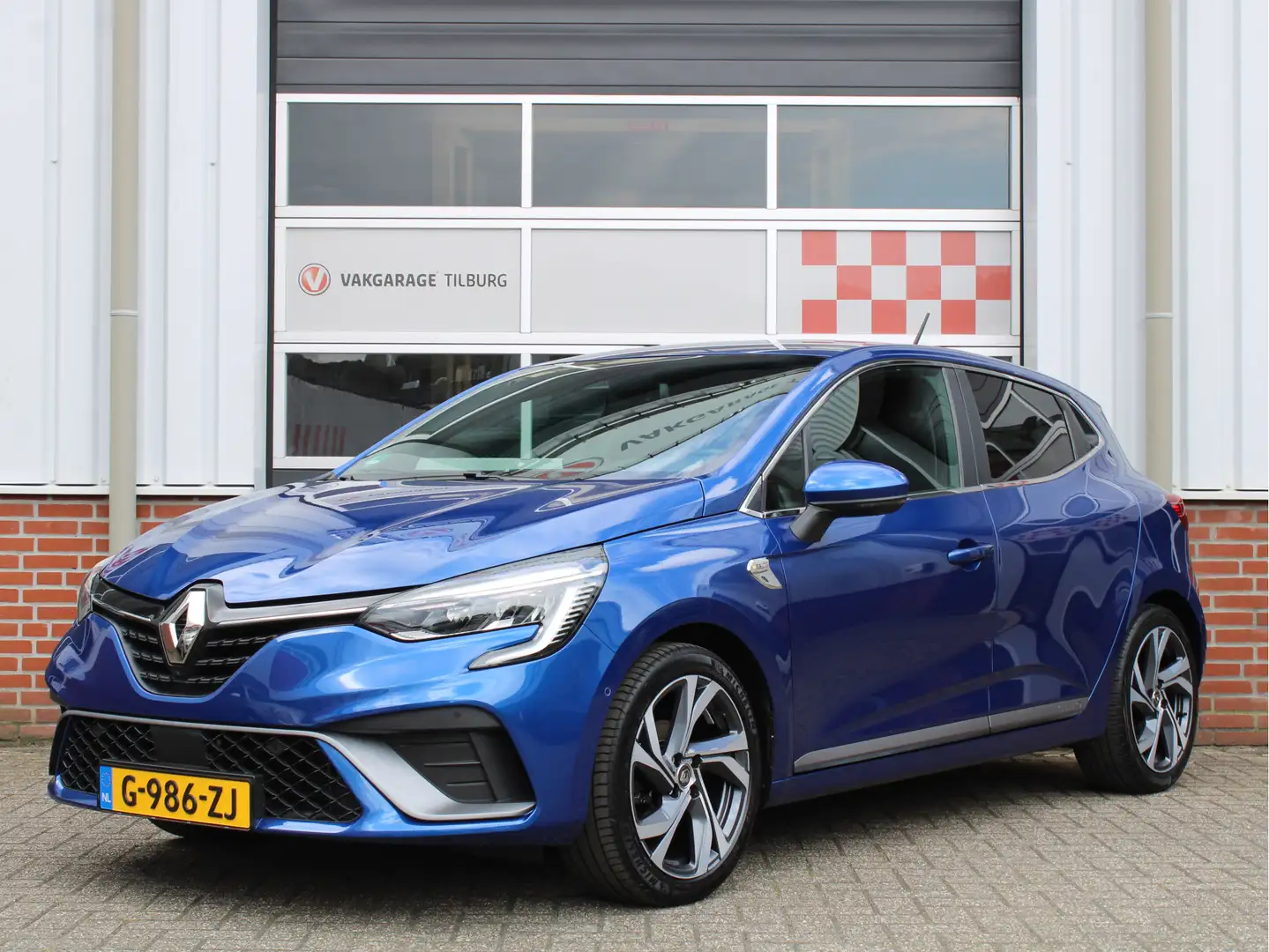 Renault Clio 1.0 TCe 100PK R.S. Line /NAVI/PDC/360° Camera/17'L Blauw - 1