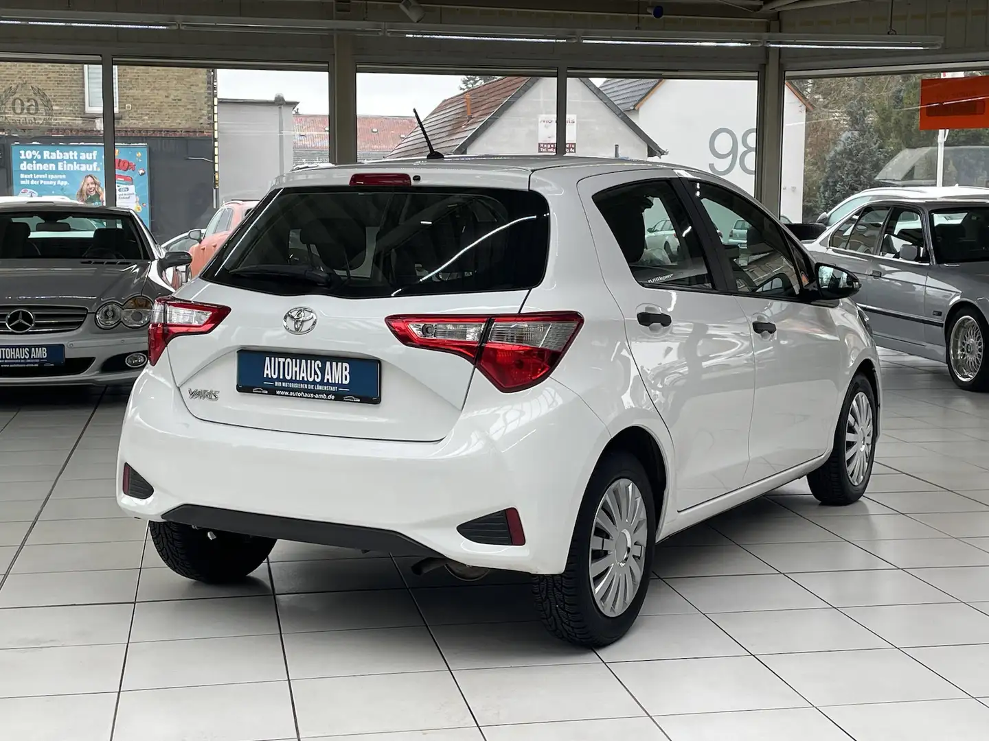 Toyota Yaris 1.0 Basis Klima BT USB AUX 4 Türig Weiß - 2