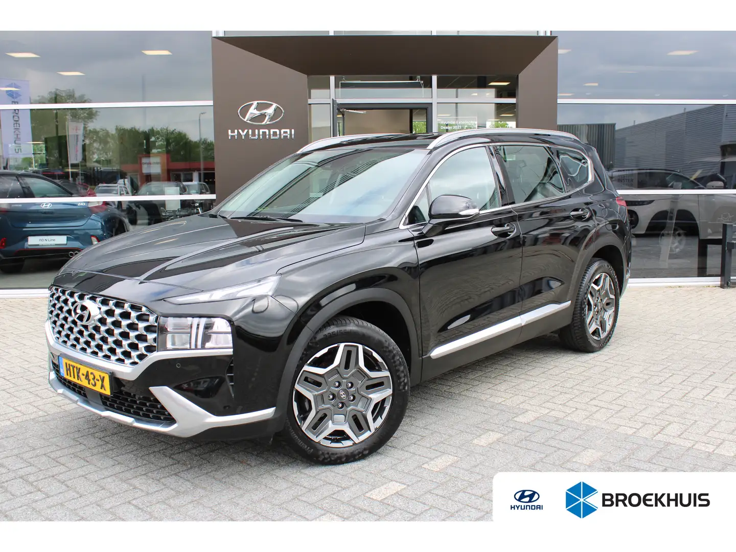 Hyundai SANTA FE 1.6 T-GDI PHEV Comfort Smart 7p. | Eleketrisch bed Zwart - 1