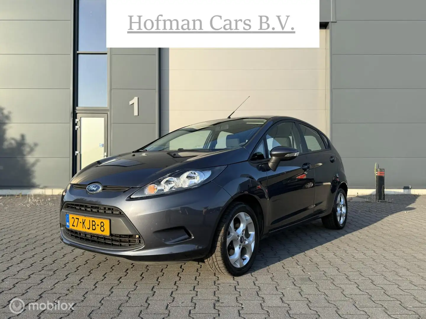 Ford Fiesta 1.25 4-cil Limited 60PK 5-drs trekhaak LM velgen N Grijs - 1