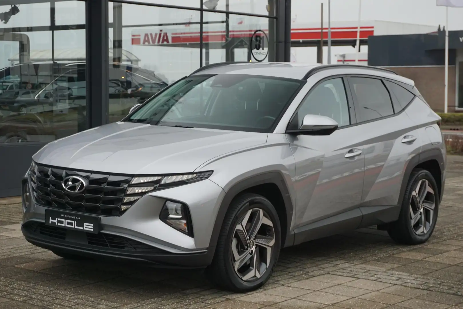Hyundai TUCSON 1.6 T-GDI PHEV Comfort 4WD | Carplay | Stuur+stoel Grau - 1