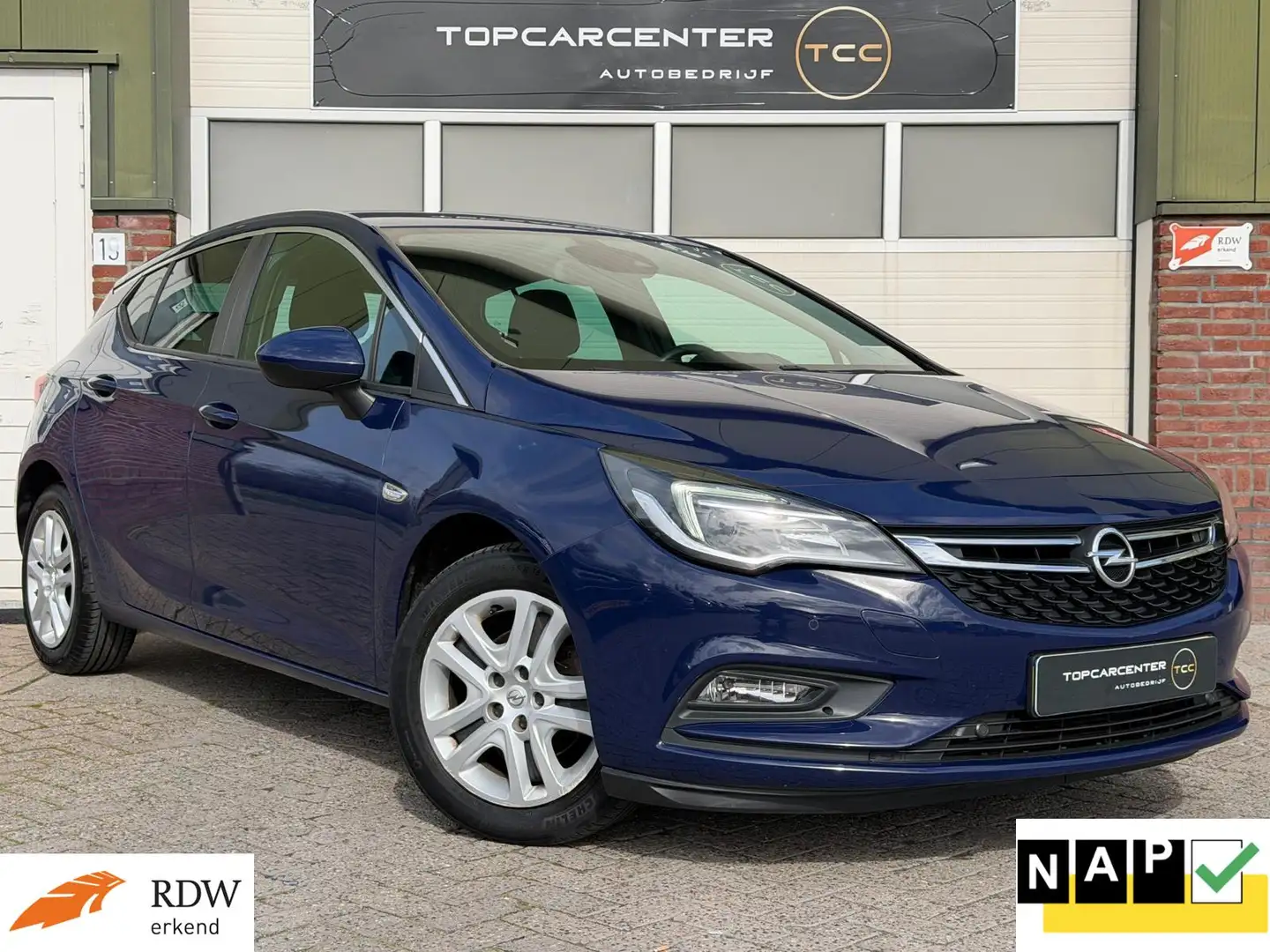 Opel Astra 1.0 Business+/AIRCO/PARKS/NAVI/CAMERA/APK/NAP Blau - 1