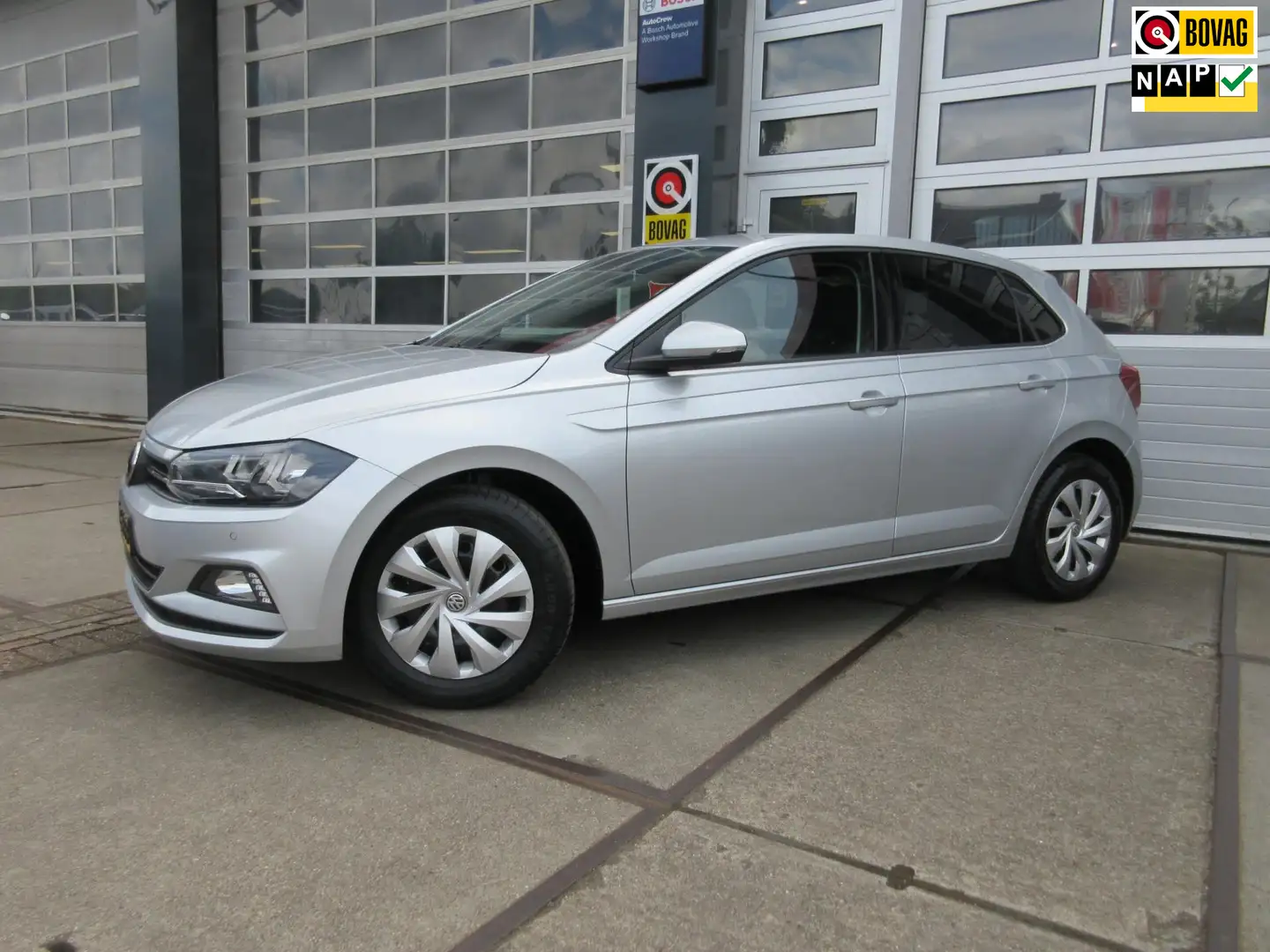 Volkswagen Polo 1.0 TSI Comfortline / Airco / PDC / Navi / D-Glas Gris - 1