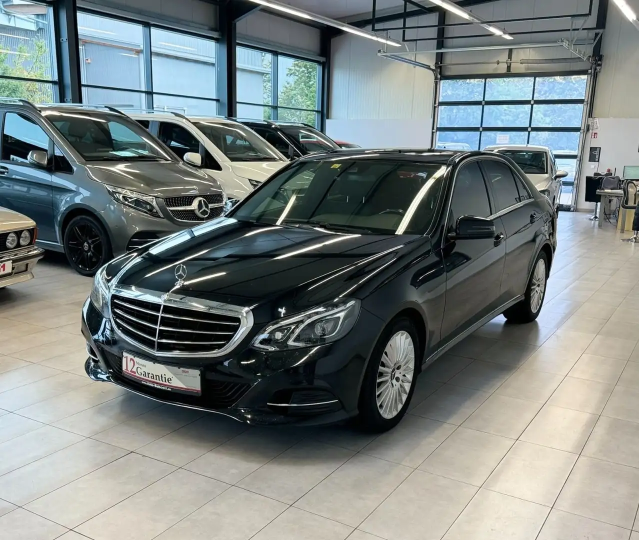 Mercedes-Benz E 220 d BlueTec*Schiebedach*Automatik*Kamera* Schwarz - 1