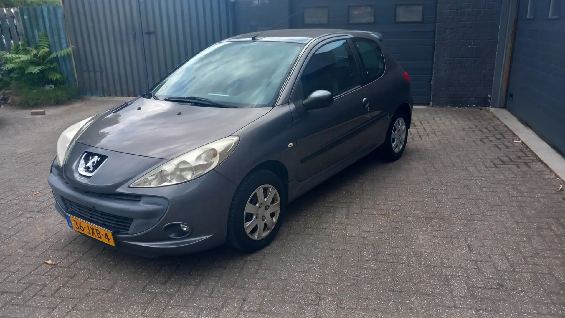 Peugeot 206 + 1.4 XS Elektrisch ramen Radio cd speler. Zeer mo Grijs - 1
