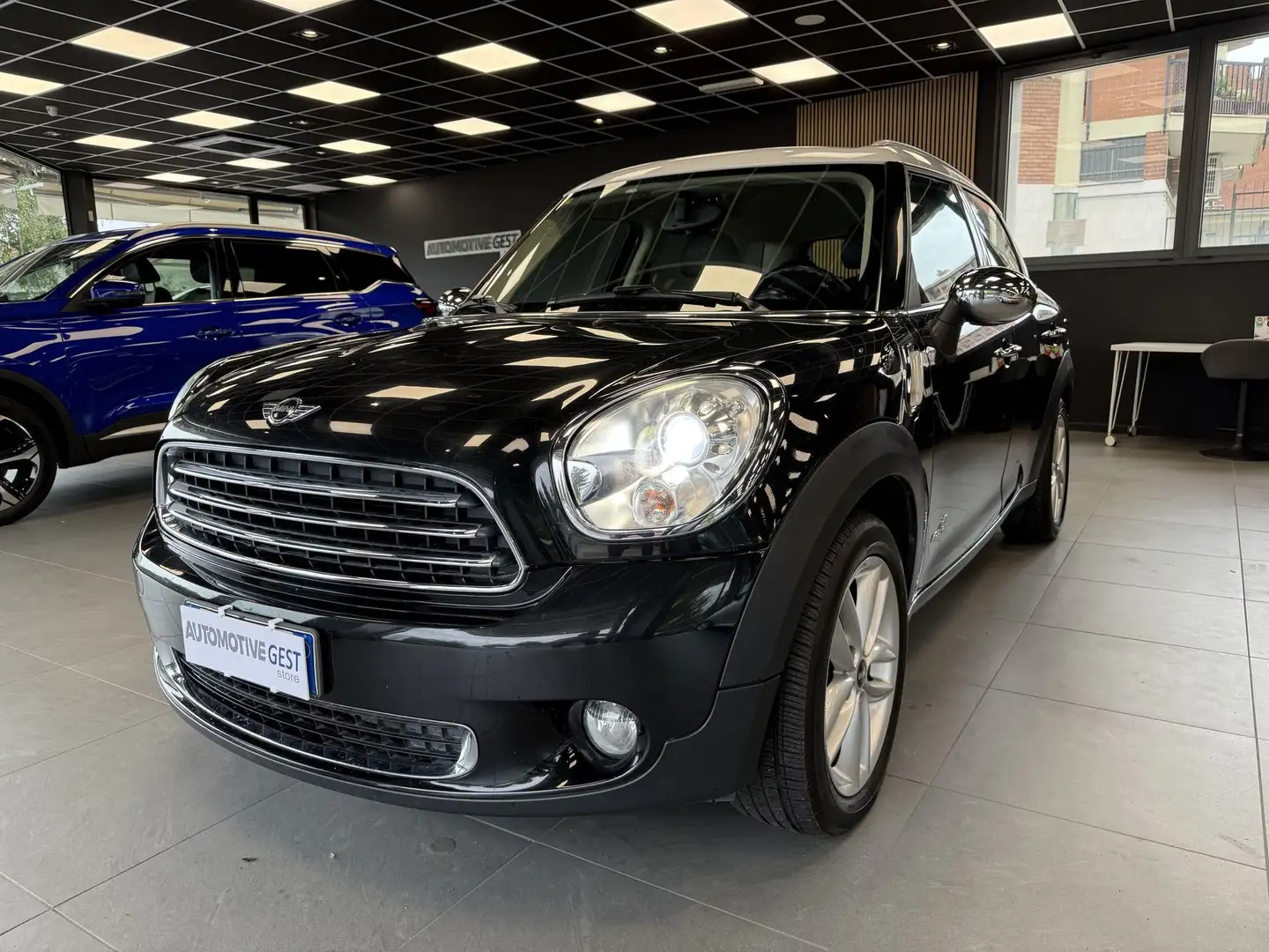 MINI Cooper D Countryman Mini 1.6 Cooper D Countryman ALL4 Zwart - 1