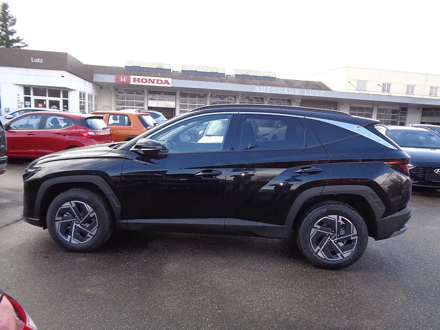 Hyundai TUCSON Tucson 1,6 T-GDI HEV 2WD Jubilé Aut. Schwarz - 2