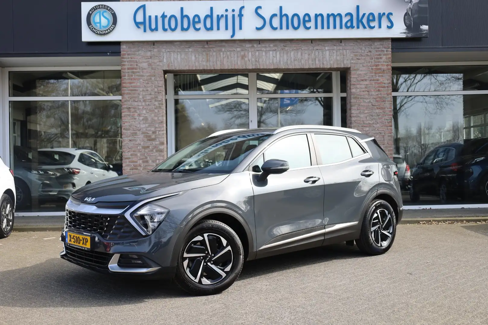 Kia Sportage 1.6 T-GDi MHEV DynamicLine TREKHAAK CAMERA NAVI DA Grijs - 1