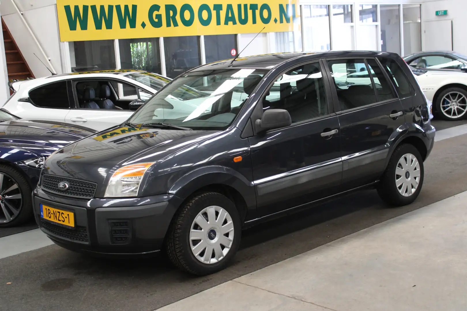Ford Fusion 1.4-16V Cool & Sound NAP, Airco, Stuurbekrachtigin Gris - 1