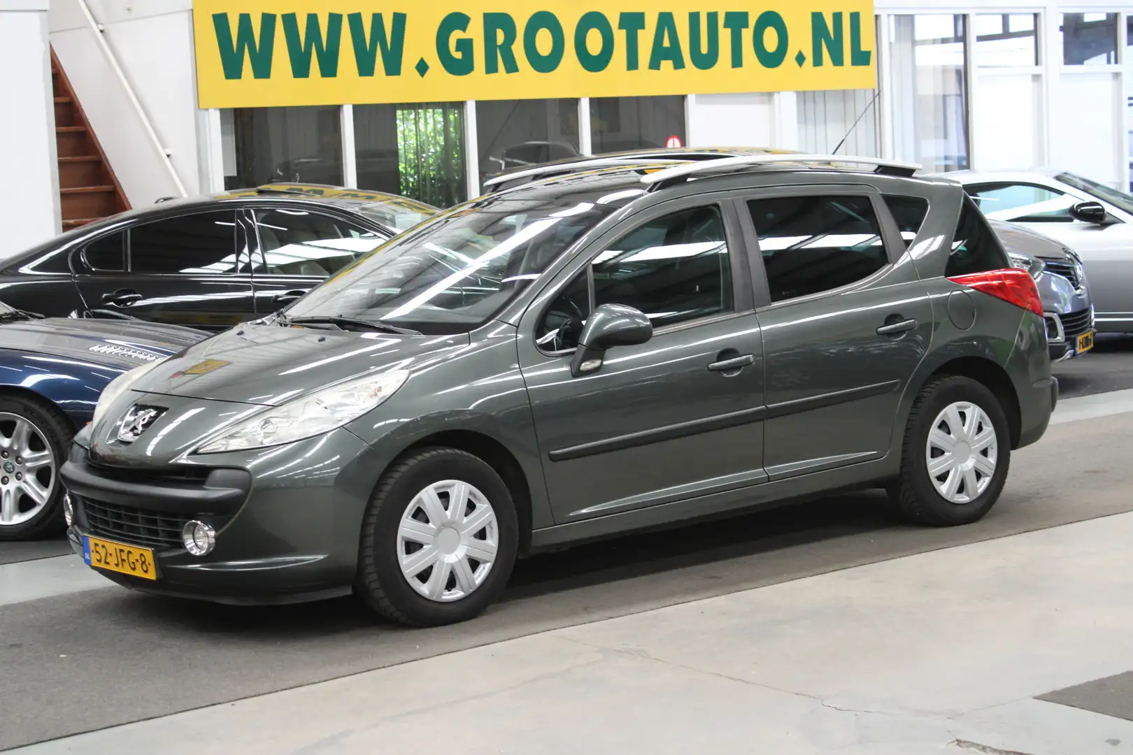 Peugeot 207 SW 1.6 VTi XS Automaat Panoramadak, NAP, Airco, Tr Grijs - 1