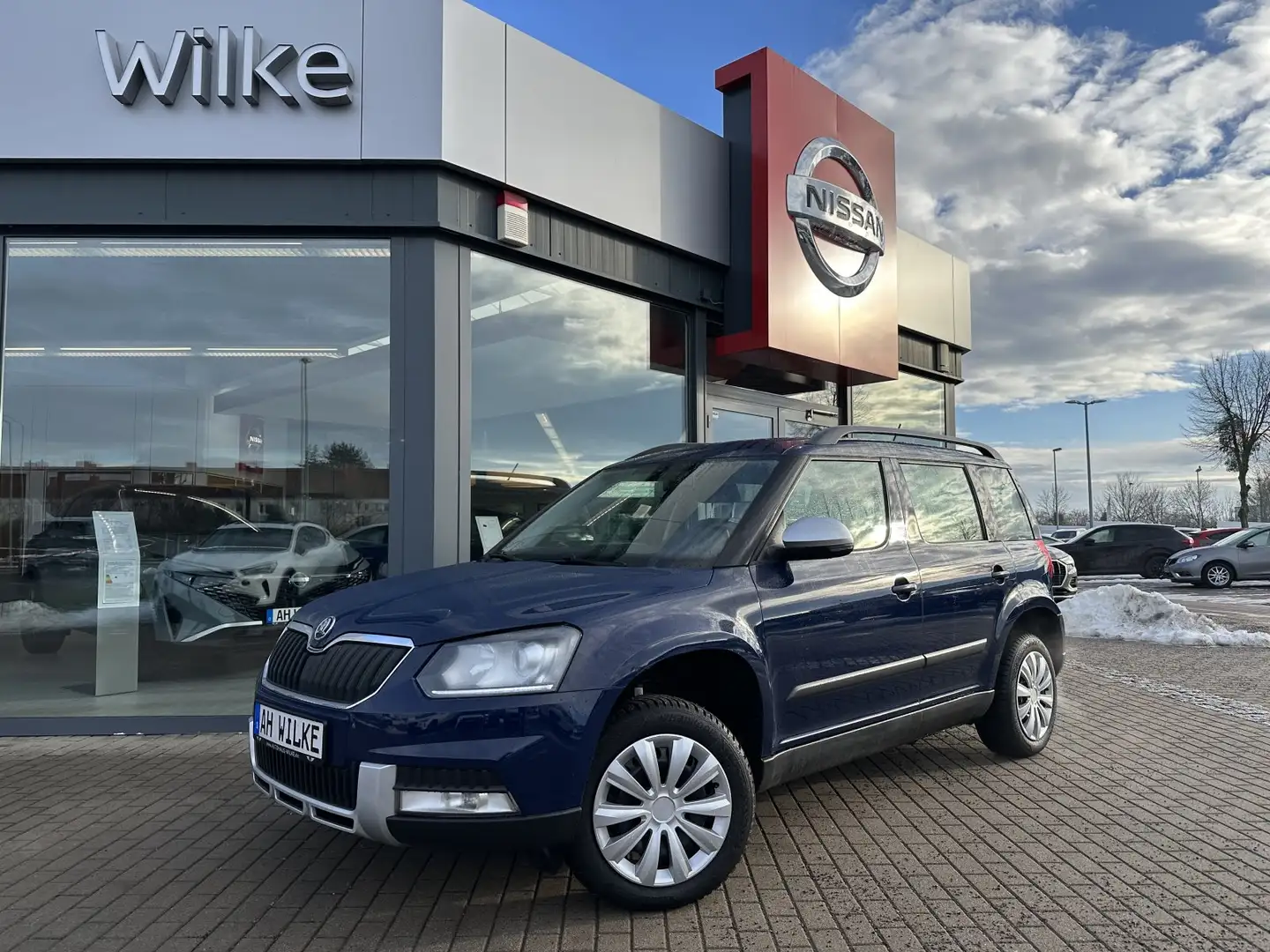 Skoda Yeti 2.0 TDI Ambition Outdoor /XENON/AHK/1 HAND Blau - 1
