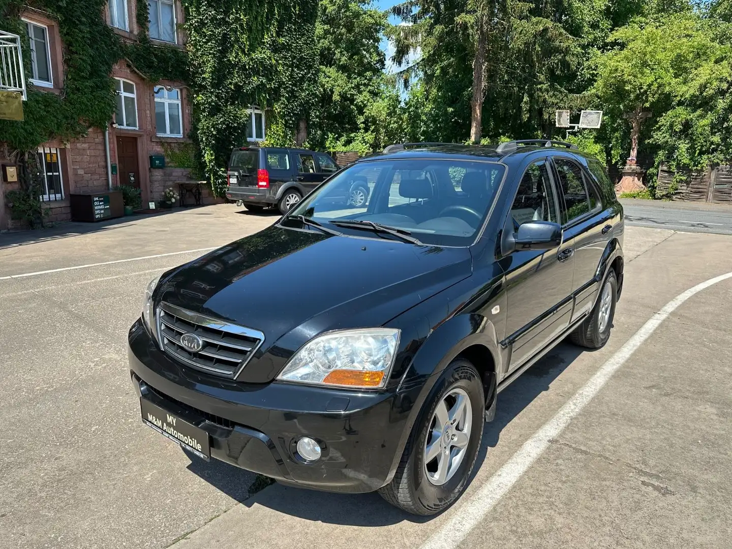 Kia Sorento 2.5 CRDi VGT EX/Automatik/AHK 3.5T/Leder Schwarz - 1