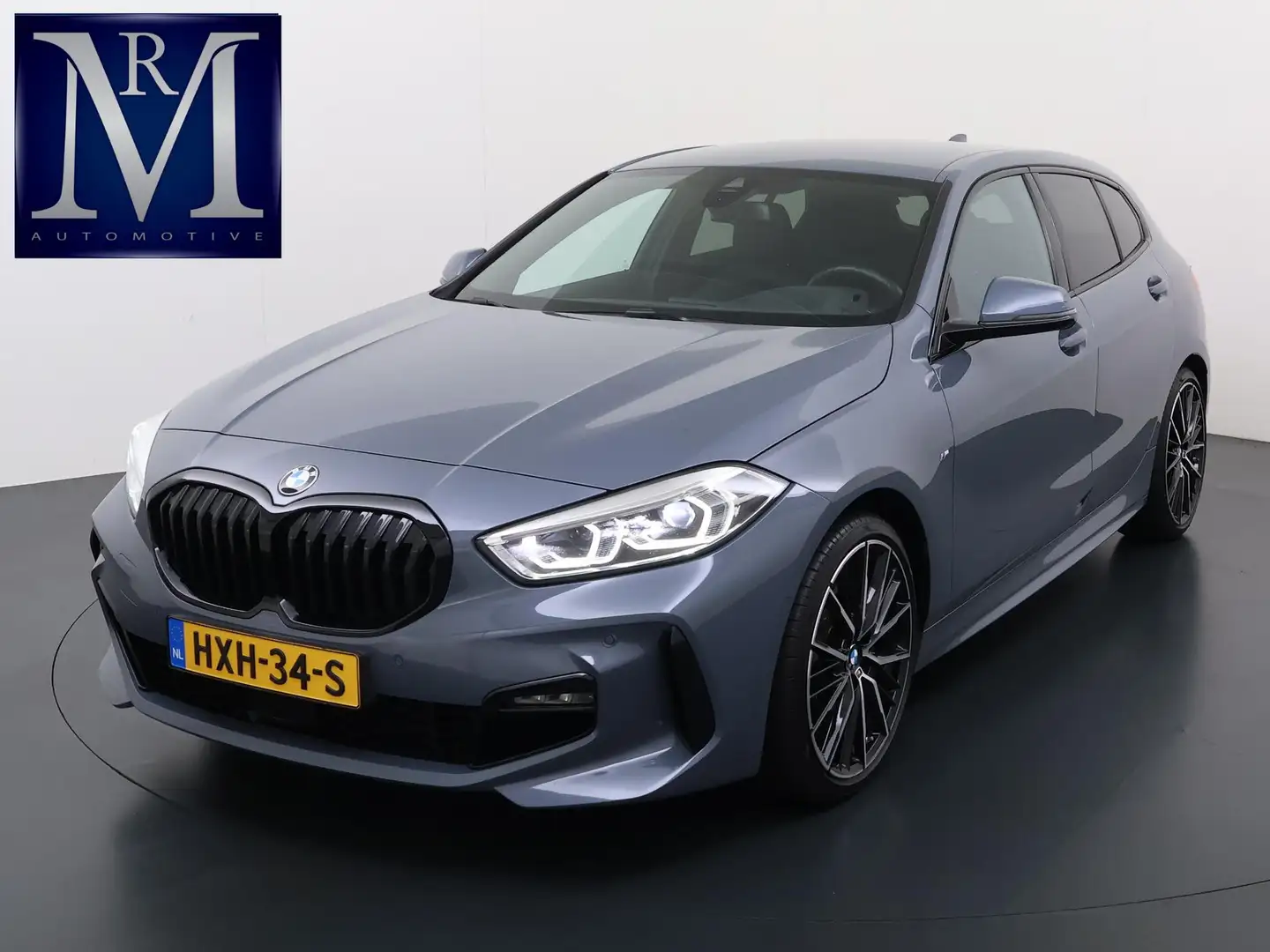 BMW 118 1-serie 118i Executive Edition M Sport VAN: €34.90 Grijs - 1