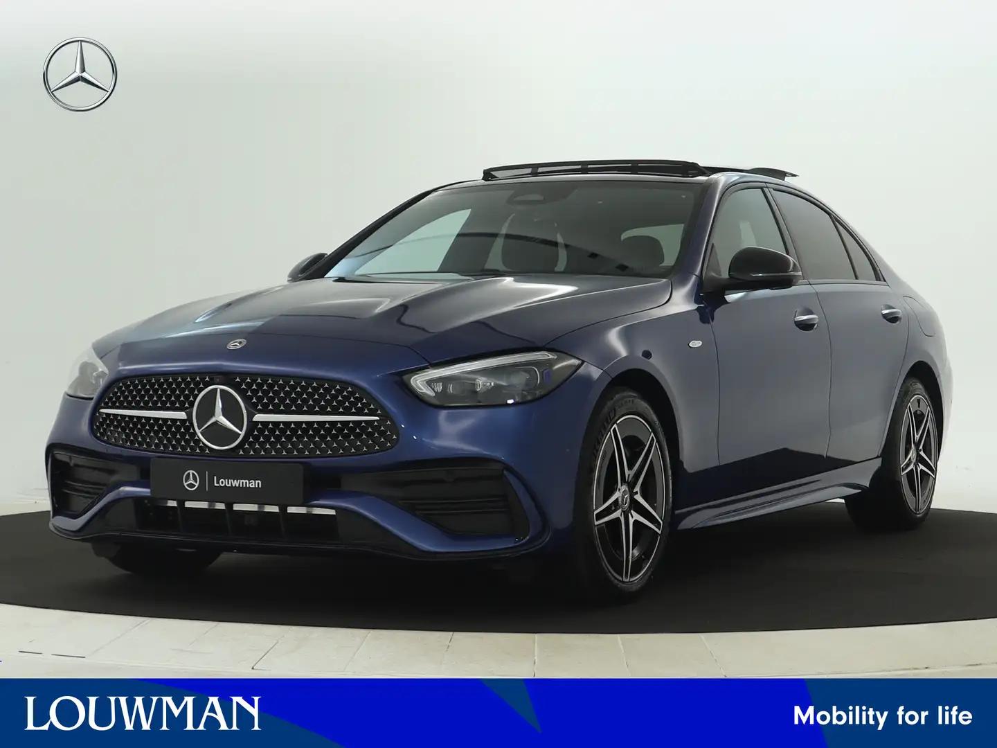 Mercedes-Benz C 300 e Business Solution AMG | Trekhaak | Nightpakket | Blauw - 1