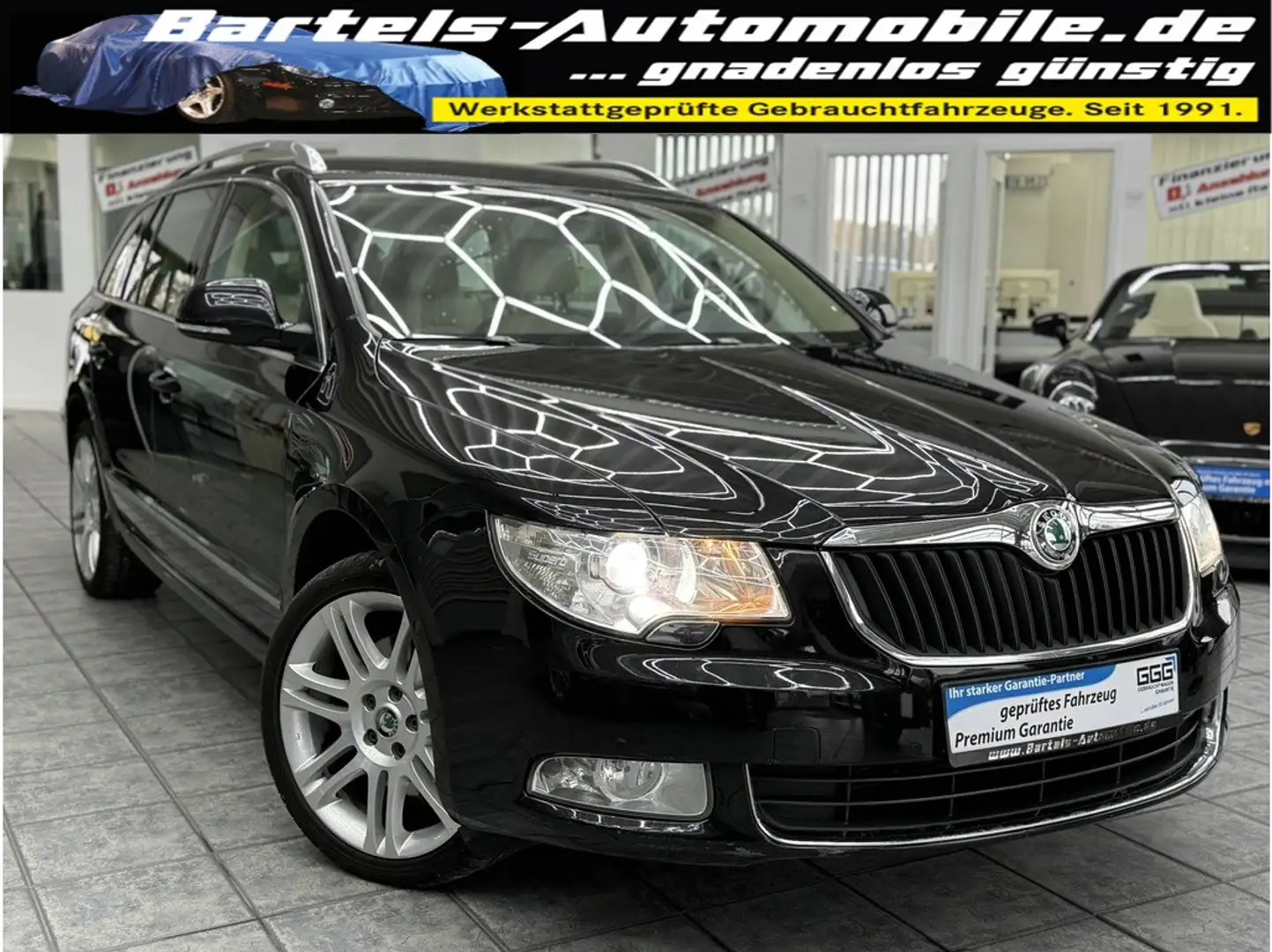 Skoda Superb Combi 2.0 TDI 4x4 Elegance, Leder, Navi Schwarz - 1