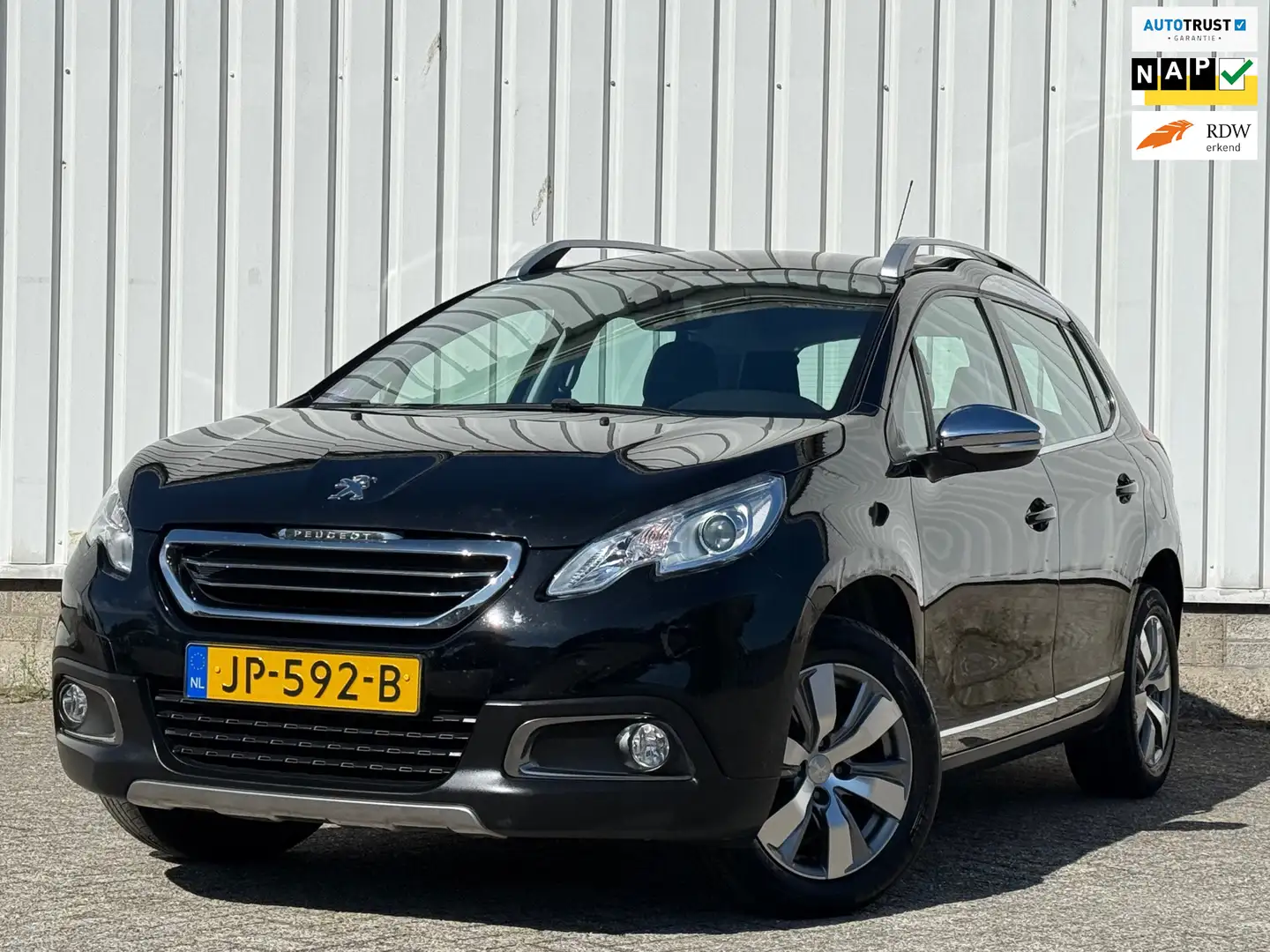 Peugeot 2008 1.2 PureTech Allure D-RiemVV,Trekhaak,Climate,Navi Schwarz - 1