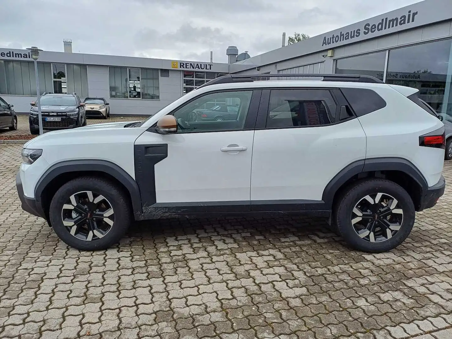 Dacia Duster Hybrid/Aut. 140 Extreme/Winterpaket+City-Paket Weiß - 2