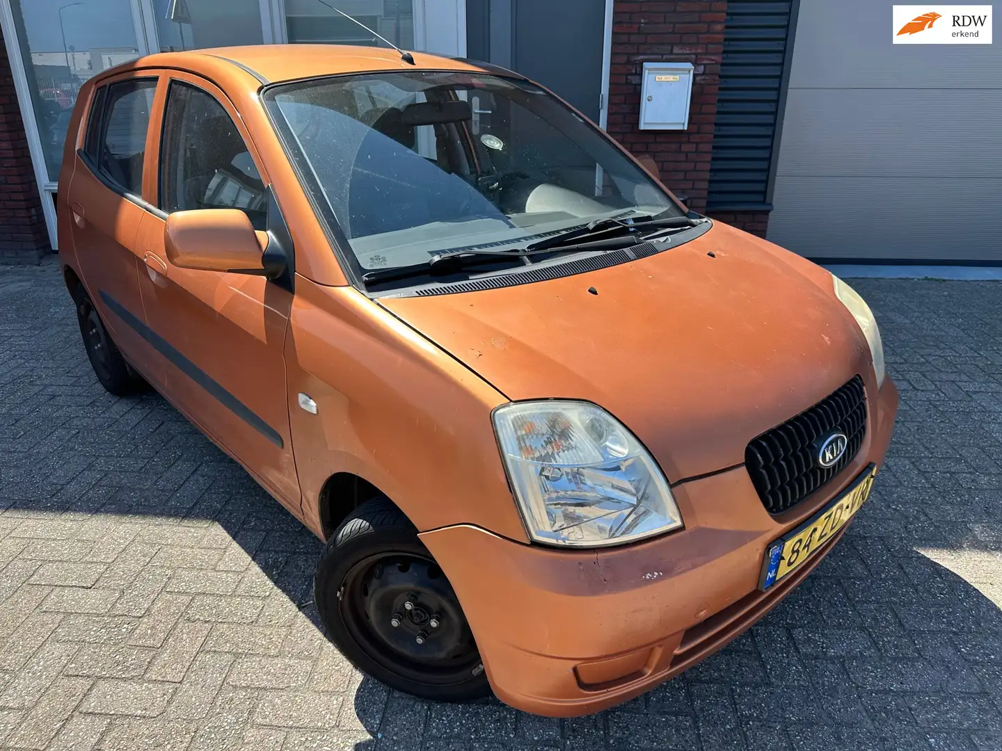 Kia Picanto 1.0 Light / 5DRS / NAP / Nieuwe APK Orange - 1