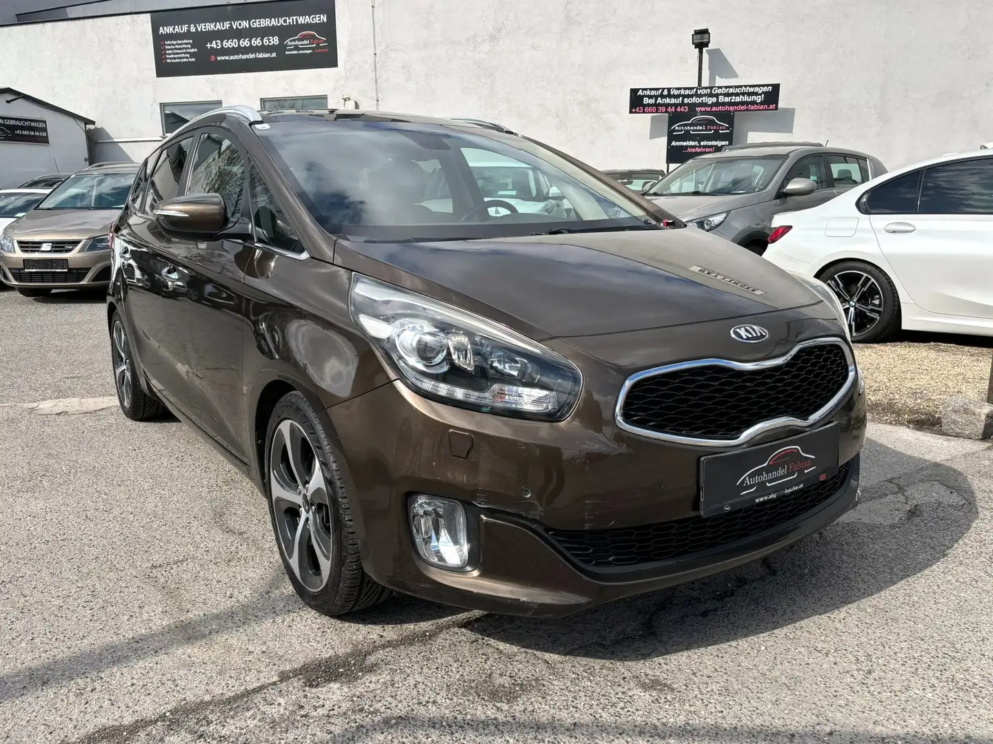 Kia Carens 1,7 CRDi ISG Platin Autom. 136PS mit PICKERL 09/26 Braun - 1
