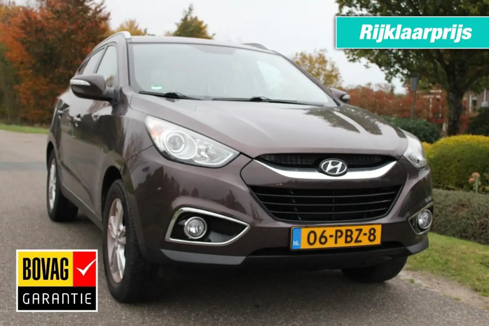 Hyundai iX35 2.0I 163pk Business Edition ECC/cruise/navi/camera Brun - 1