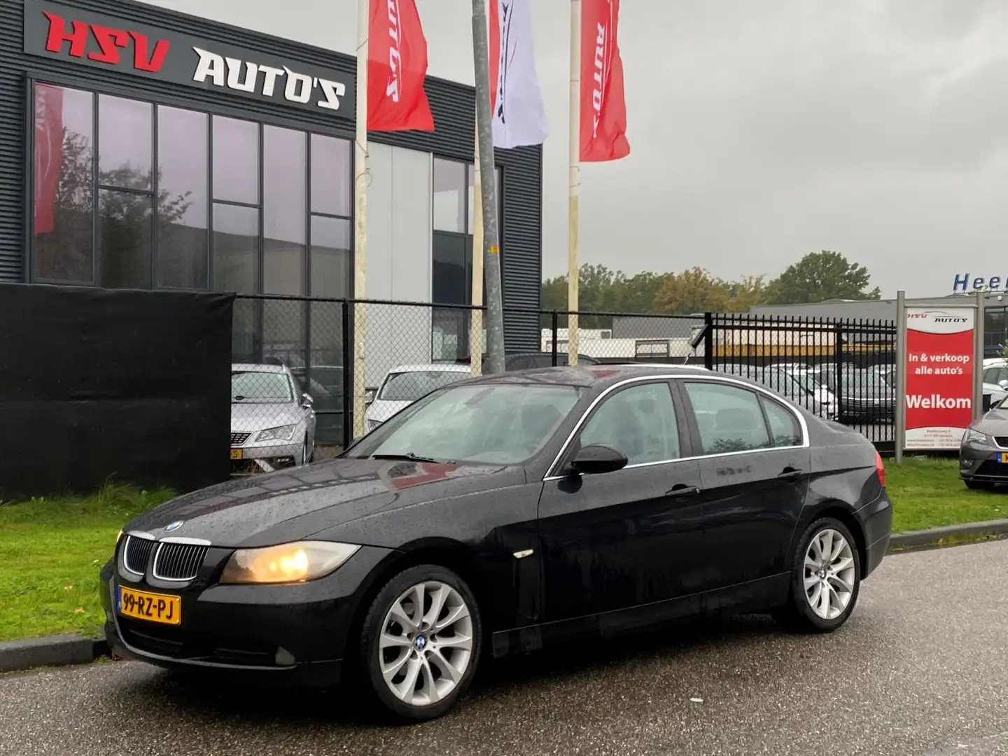 BMW 318 3-serie 318i Dynamic Executive airco LM org NL Zwart - 1