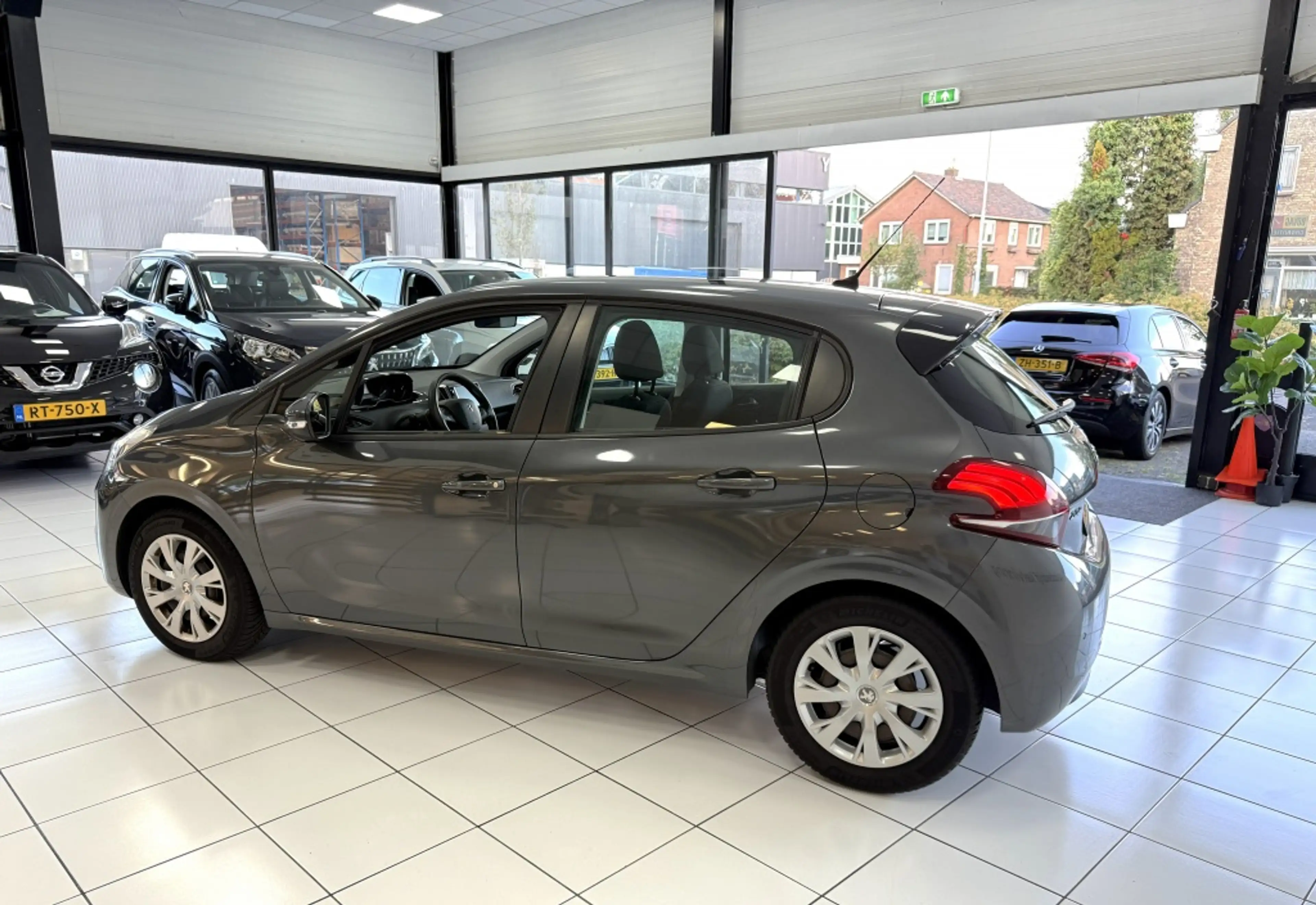 Peugeot 208 1.2 PureT. Blue Lion Bovag Garantie NAP — photo 12