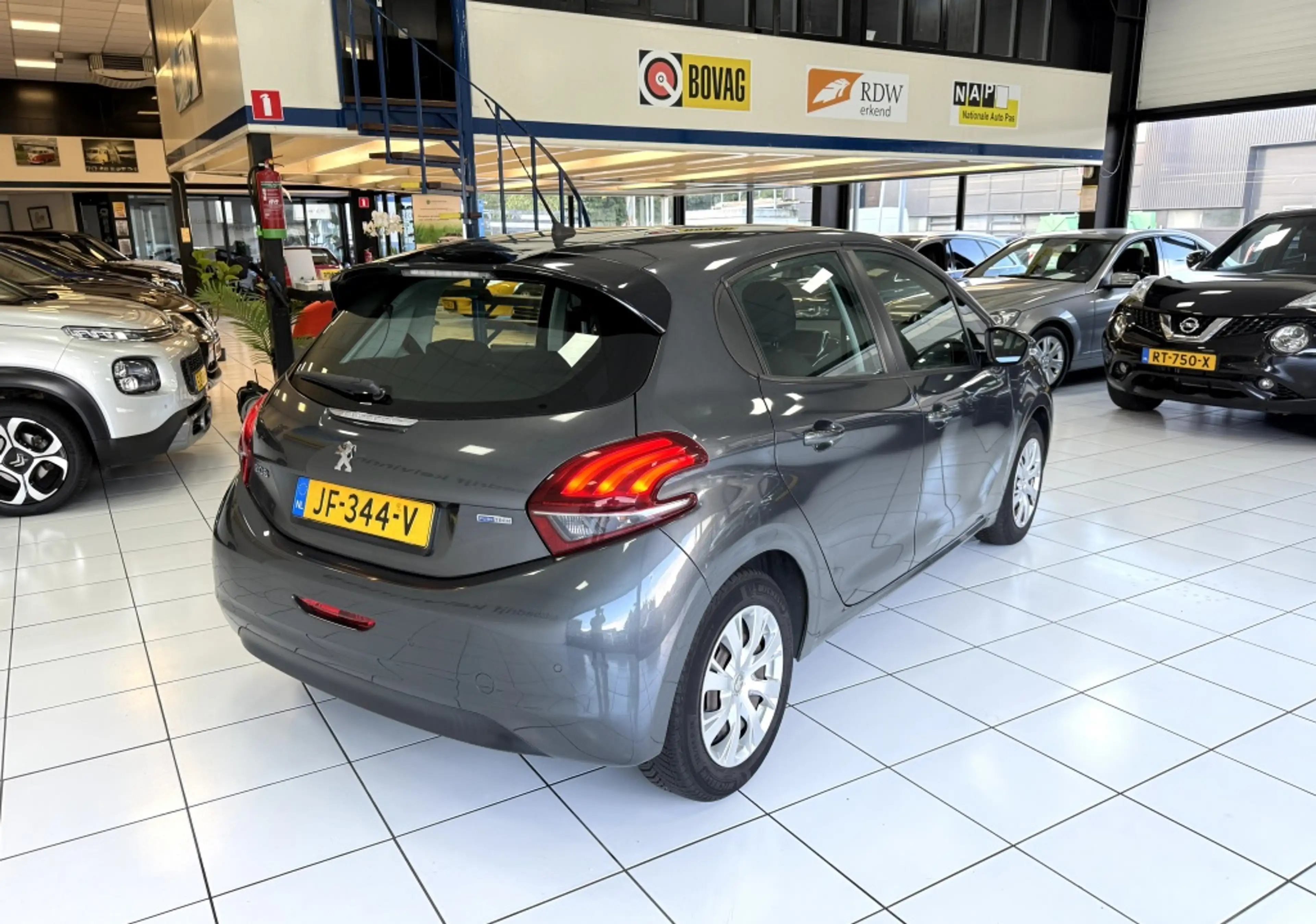Peugeot 208 1.2 PureT. Blue Lion Bovag Garantie NAP — photo 15
