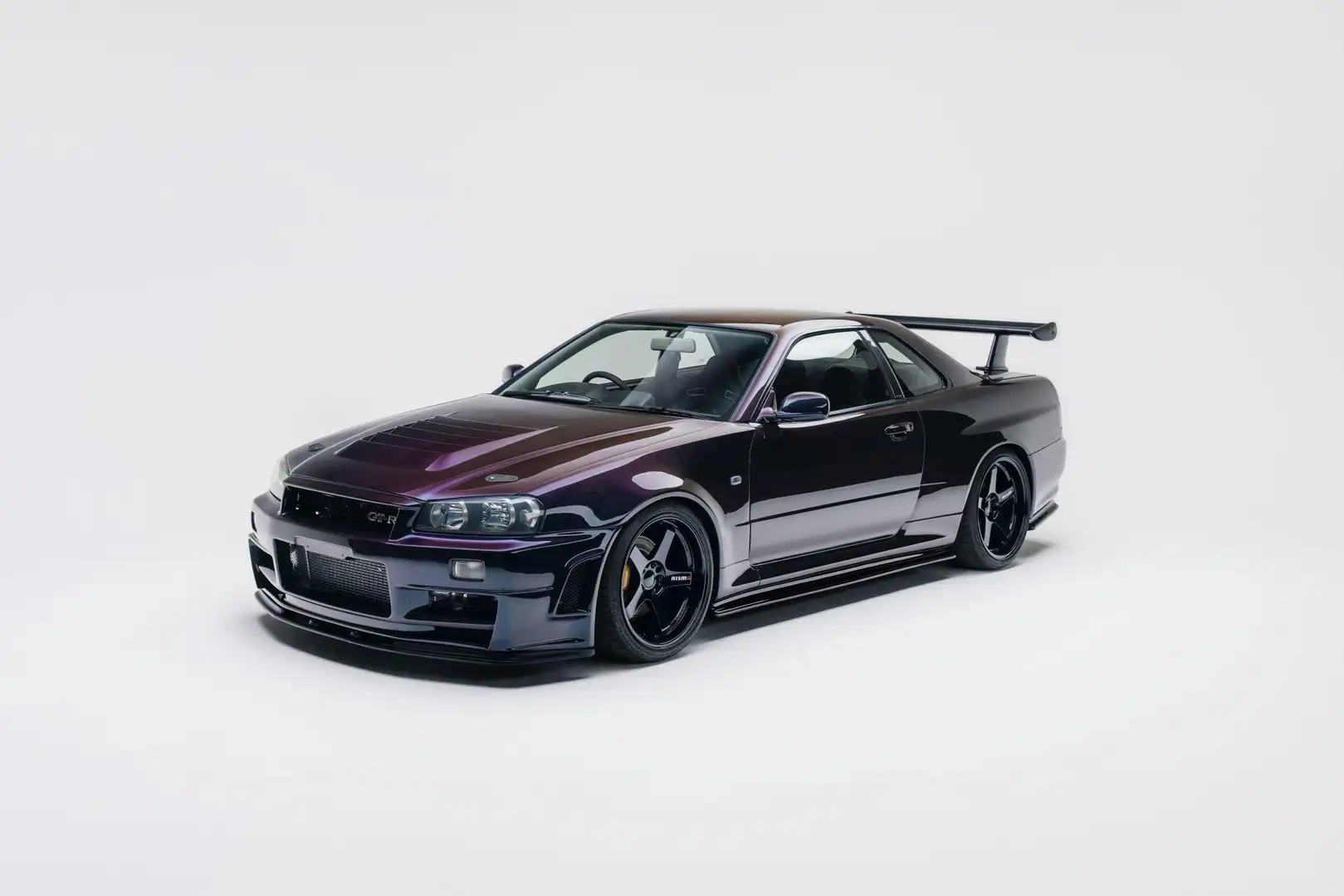 Nissan Skyline R34 GTR V-spec Midnight Purple II - 1