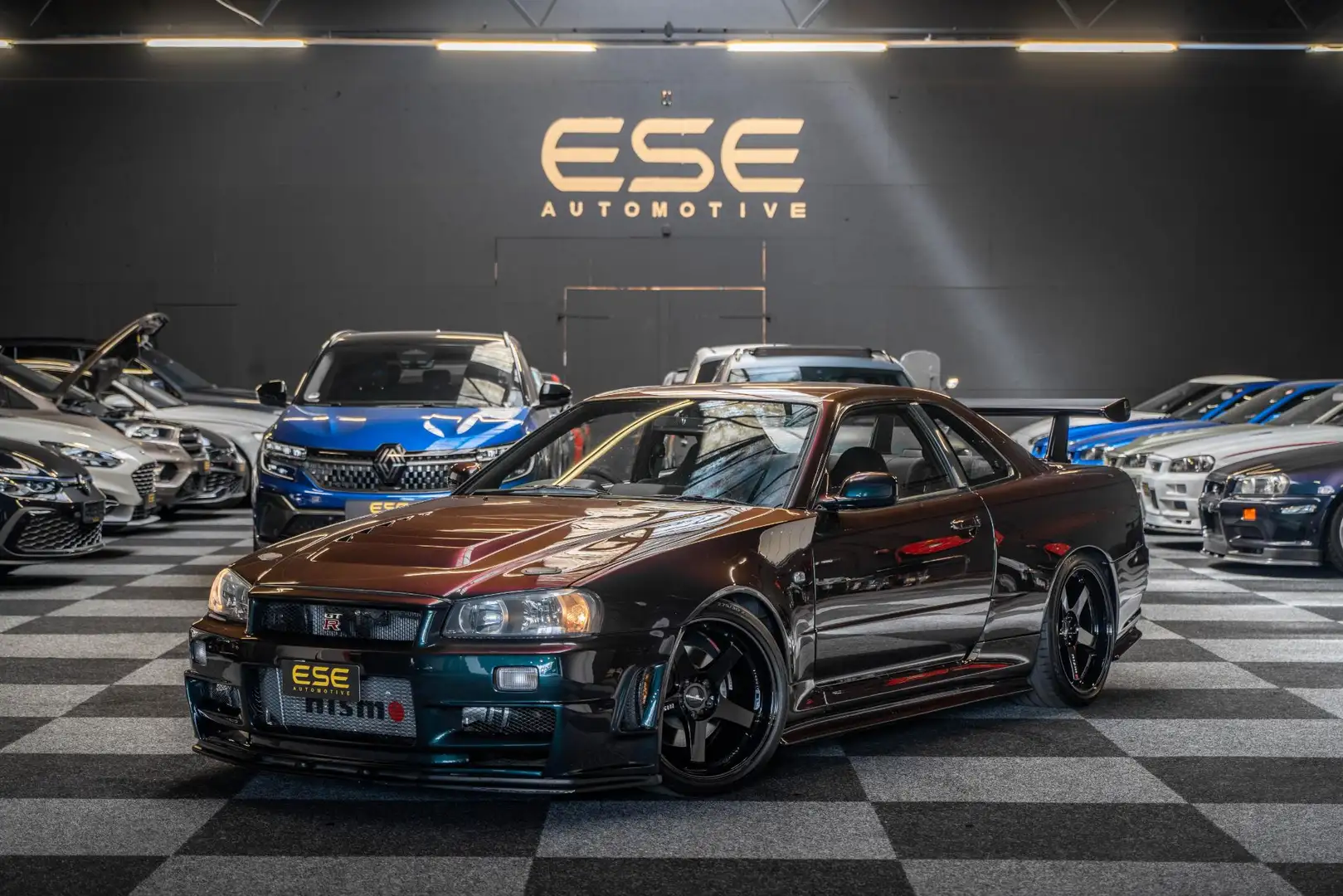 Nissan Skyline R34 GTR V-spec Midnight Purple II - 1