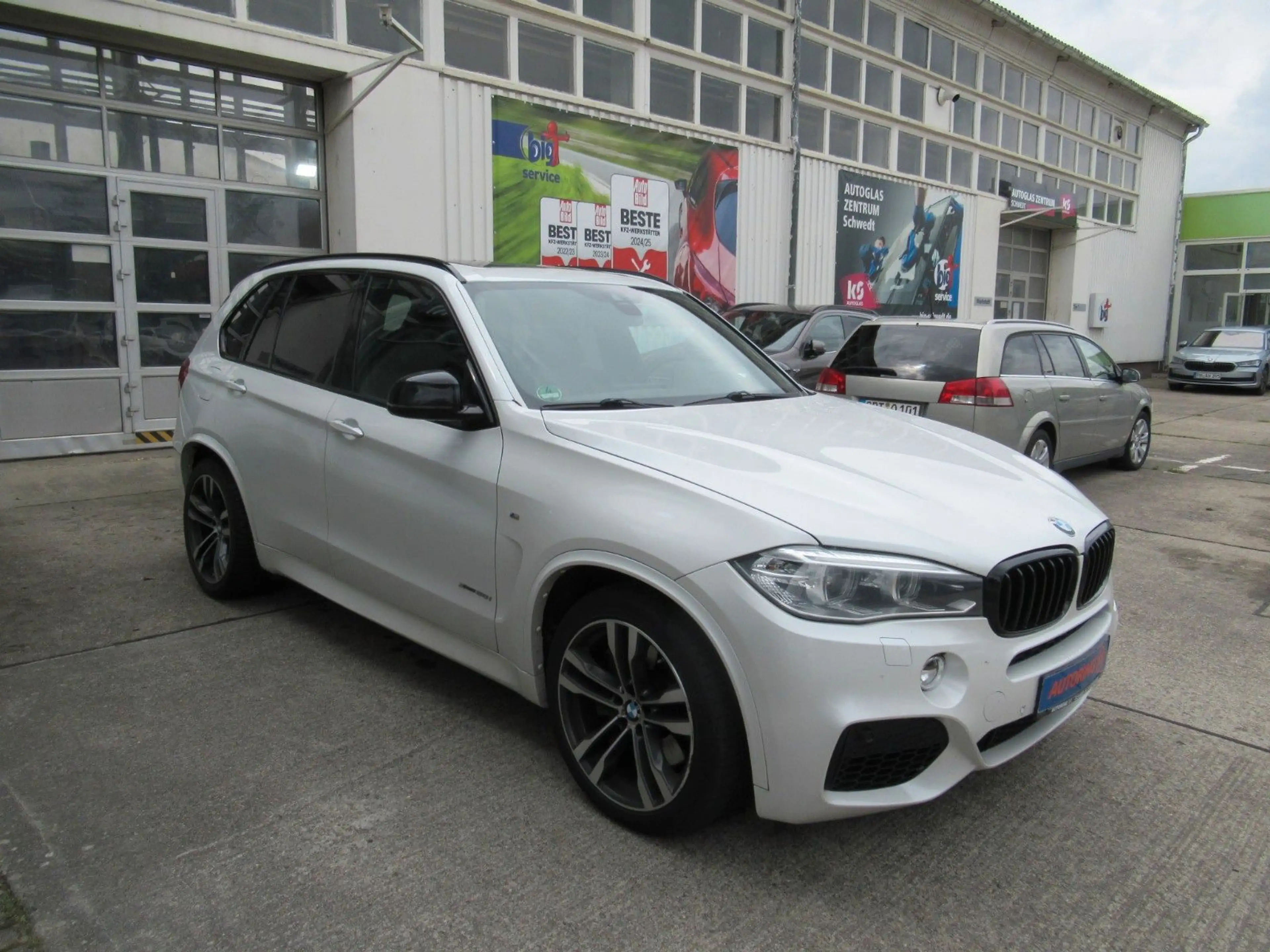BMW X5 50i M Sport M PAKET*PANO*HEAD UP*AHK*7 SITZER — photo 3
