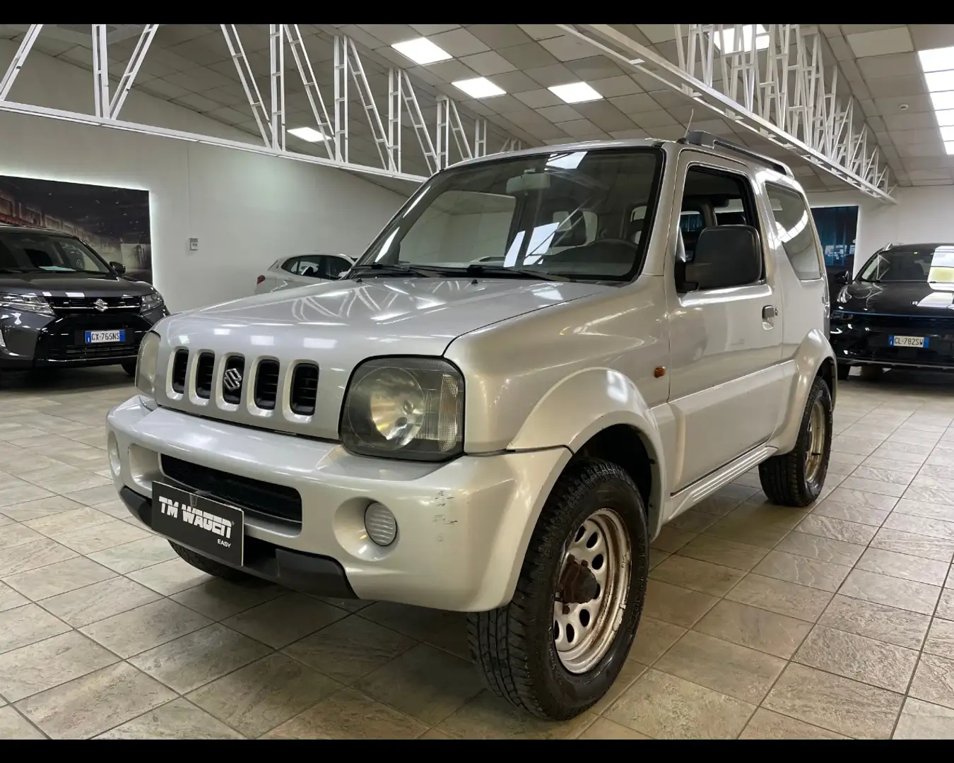 Suzuki Jimny 1.3i 16V cat 4WD JLX 4X4 * 4 POSTI * Argento - 1