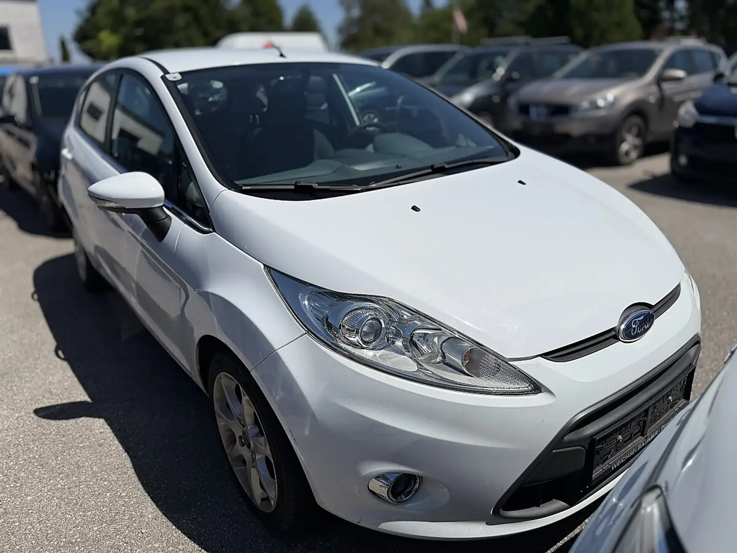 Ford Fiesta Titanium 1,25 *Pickerl 12/2026+4* Weiß - 2