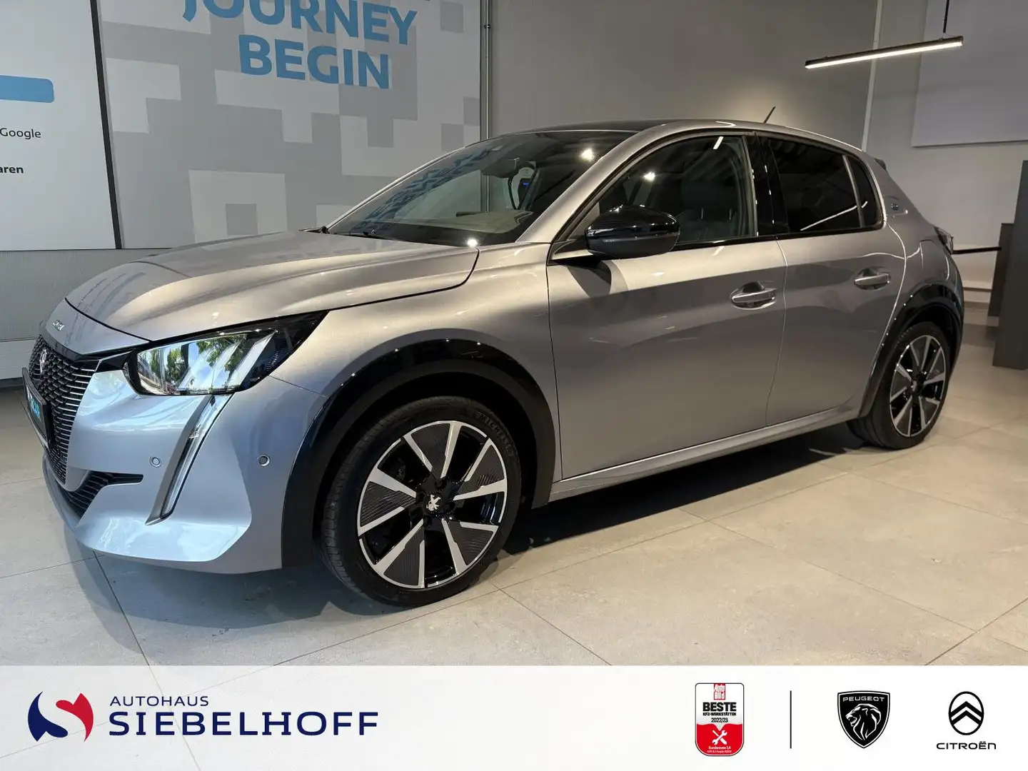 Peugeot e-208 GT Elektromotor 136 *Navi*Keyless*CAM*SHZ* Silber - 1