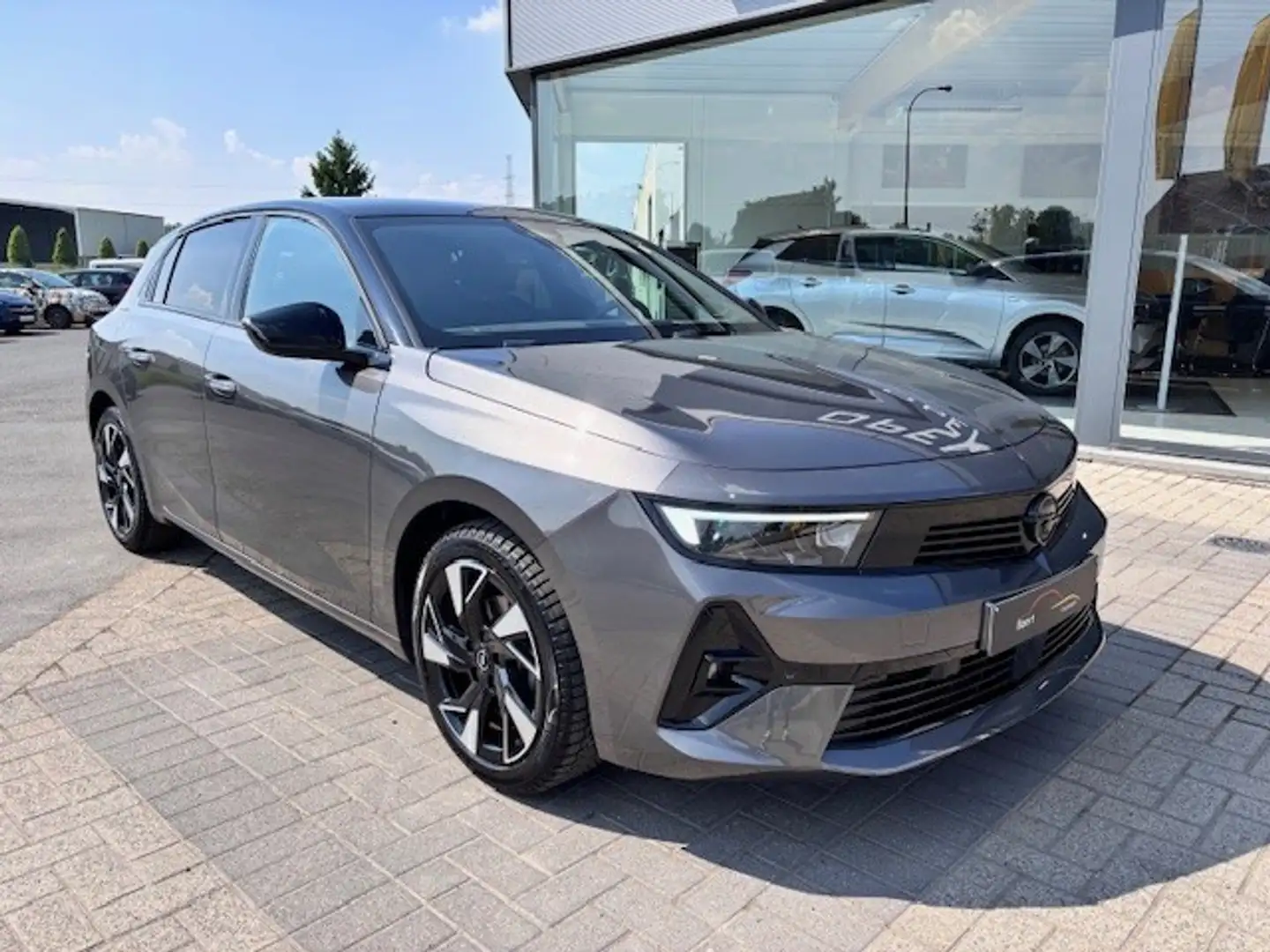 Opel Astra GS-LINE/GPS/Winterpack/360° Camera/Carplay Grijs - 1