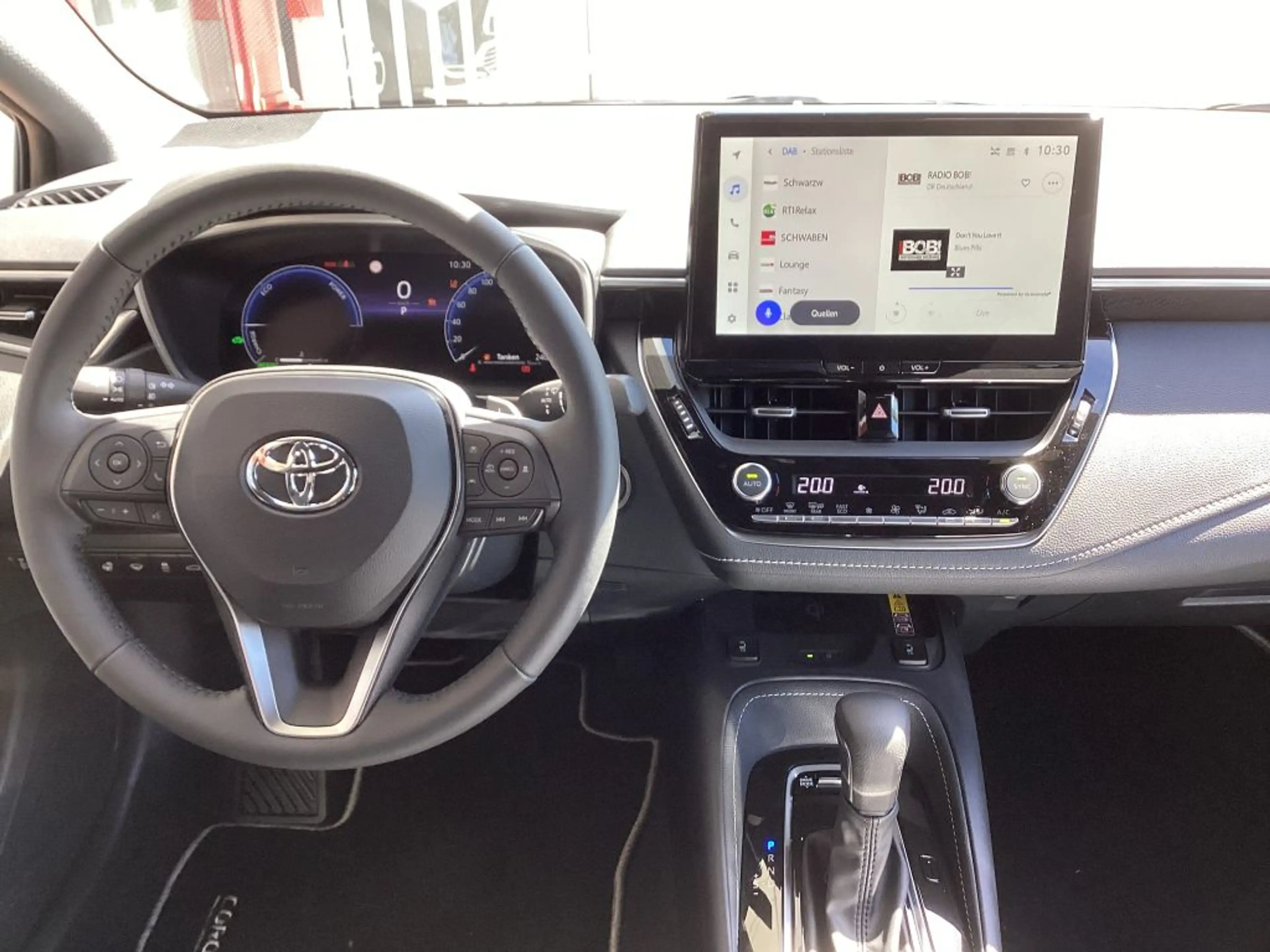 Toyota Corolla 1.8 Hybrid Touring Sports Teamplayer — photo 8
