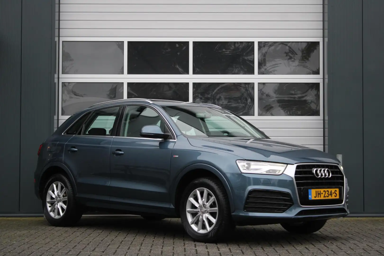 Audi Q3 1.4 TFSI CoD Adrenalin S-Line 150pk Clima/Cruise/K Bleu - 1