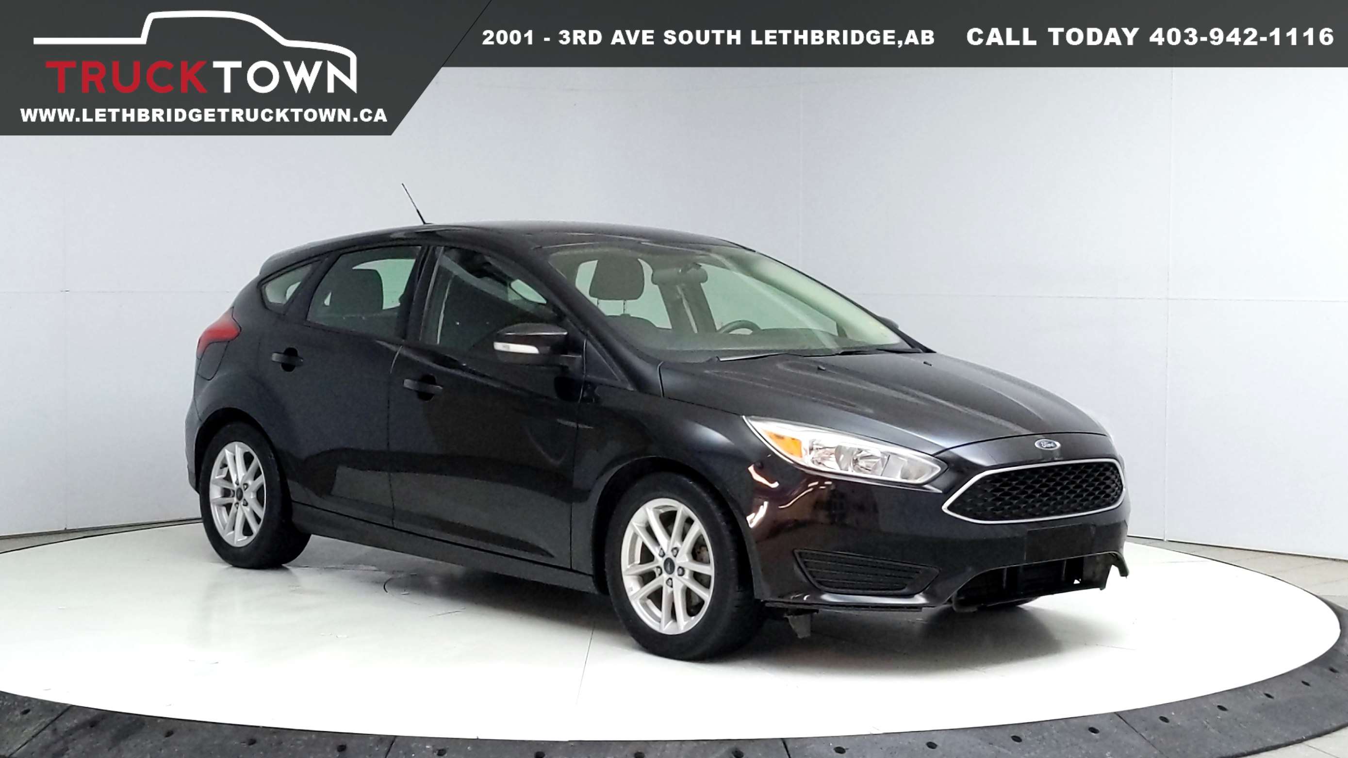 Tuxedo Black Metallic 2015 Ford Focus Hatchback Front-Wheel Drive Automatic