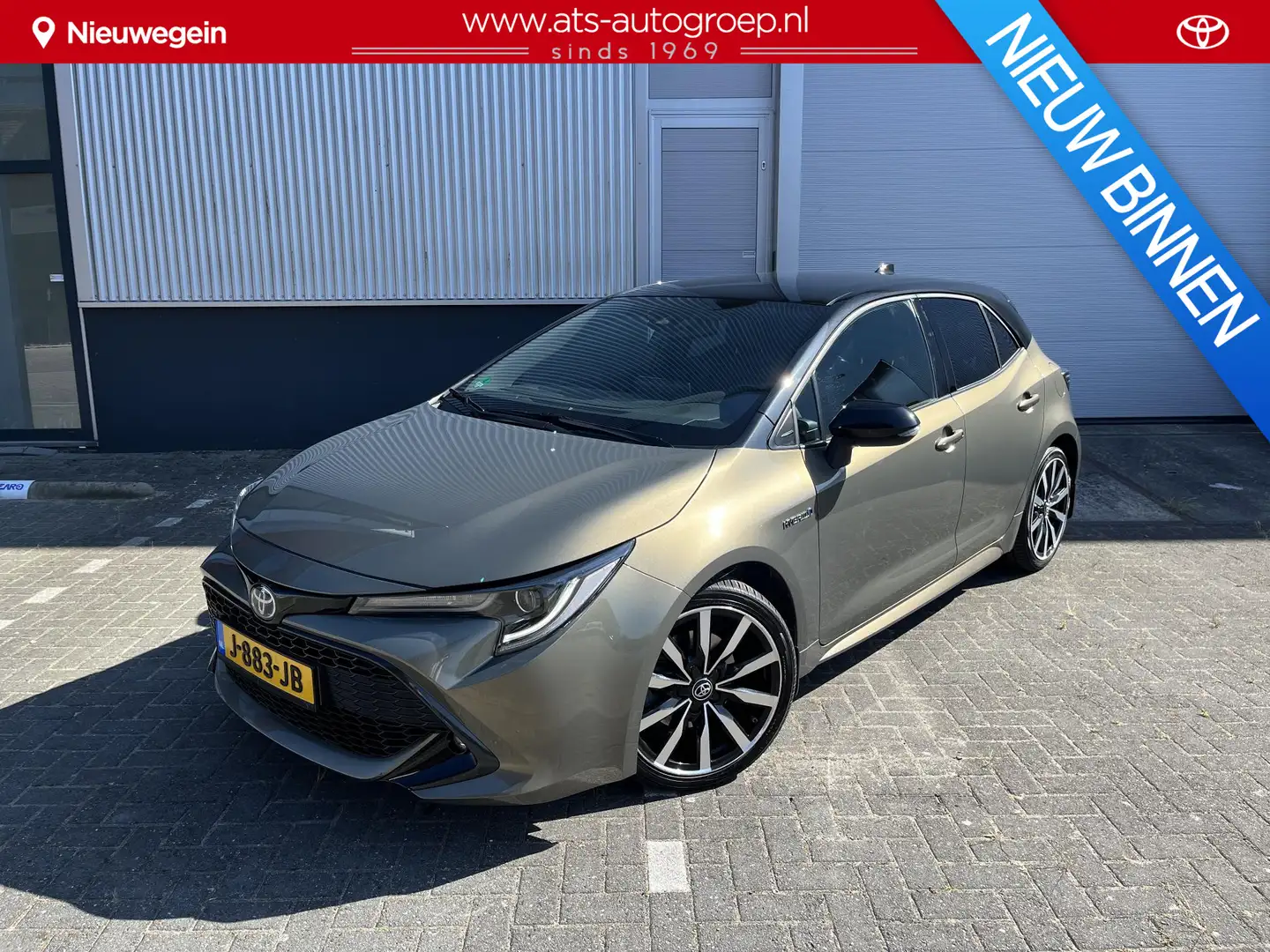 Toyota Corolla 2.0 Hybrid Dynamic Bi-Tone Groen - 1