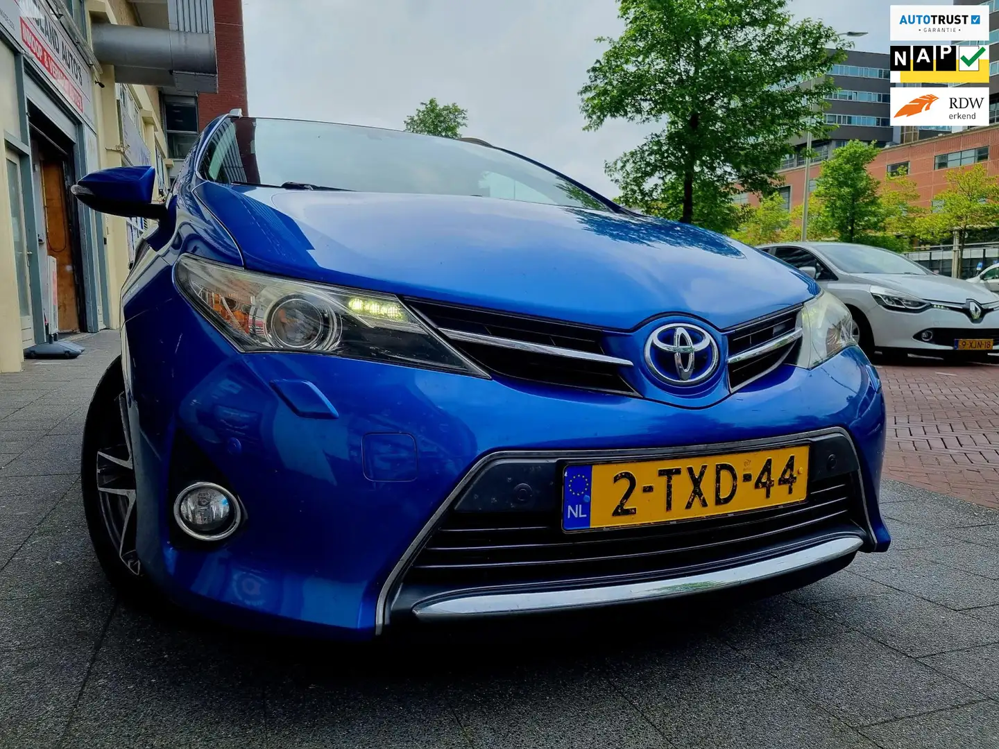 Toyota Auris Touring Sports 1.8 Hybrid Lease PanoDak Navi Camer Blauw - 1