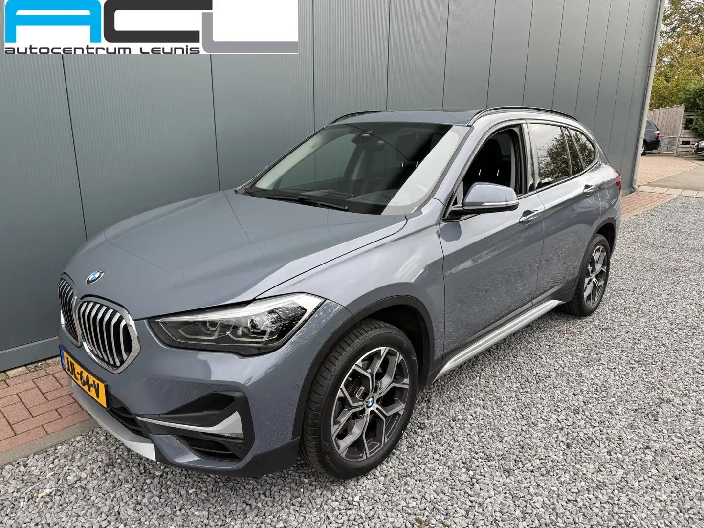 BMW X1 S-Drive20i 192pk Automaat High Executive Panoramad Gris - 1