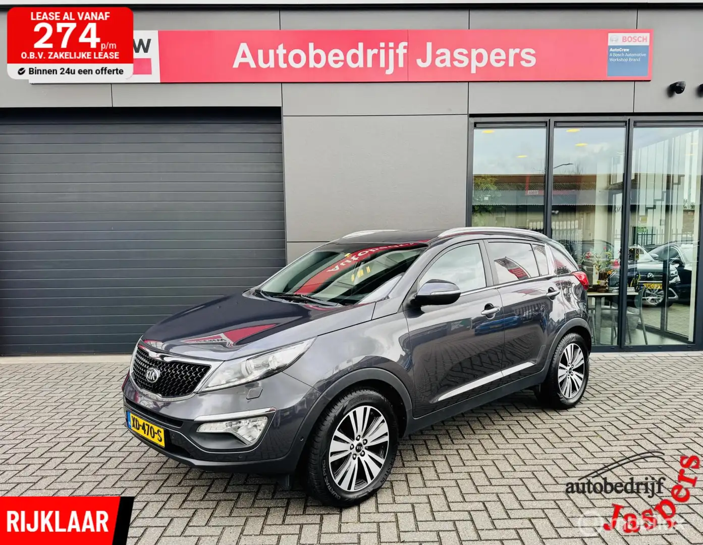 Kia Sportage 2.0 DynamicPlusLine Grijs - 1