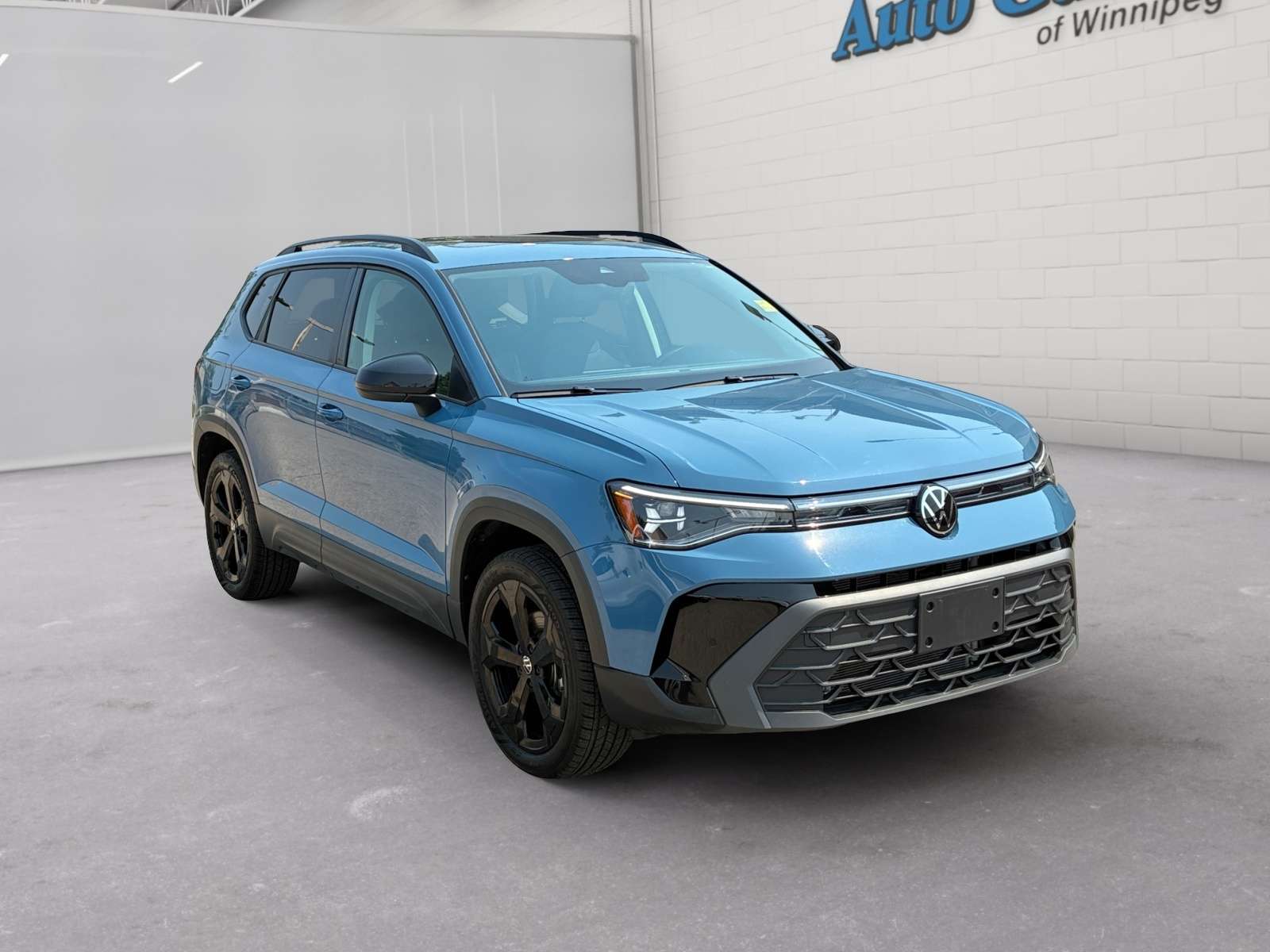 used 2025 Volkswagen Taos car, priced at $31,608
