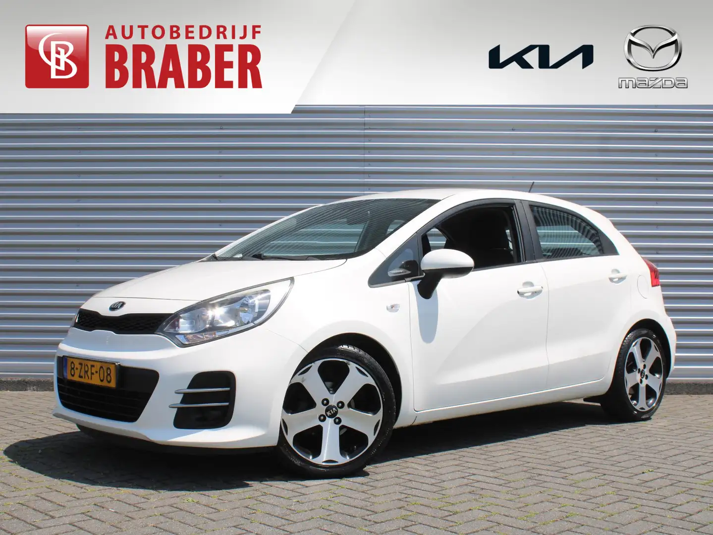 Kia Rio 1.2 CVVT ComfortLine | 17" LM | Airco | Cruise | Blanc - 1