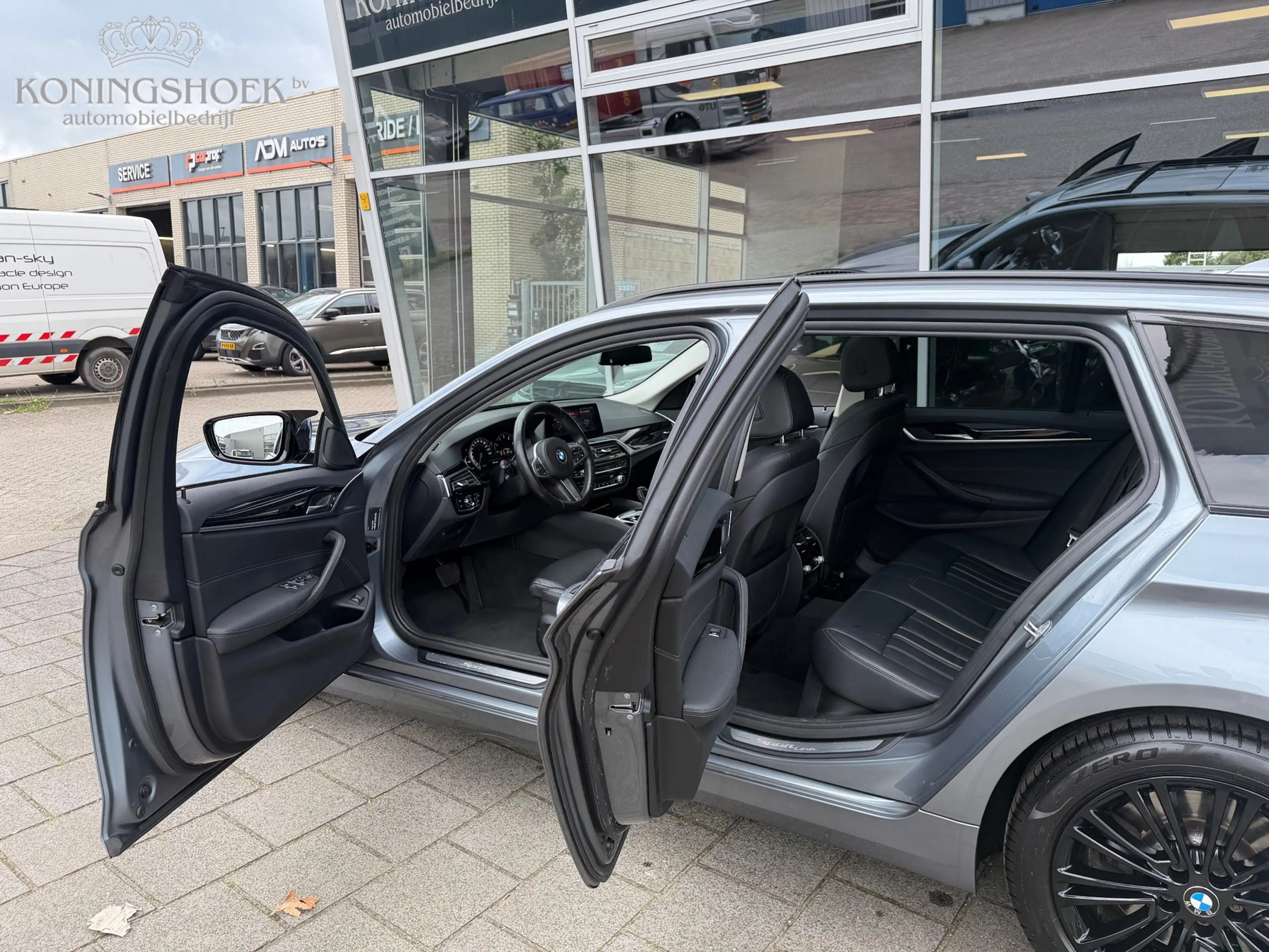 BMW 540 5-serie Touring 540i xDrive High Executive — photo 13