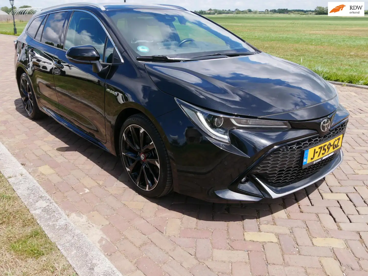 Toyota Corolla Touring Sports 2.0 Hybrid GR-Sport Plus CLIMA NAVI Zwart - 1