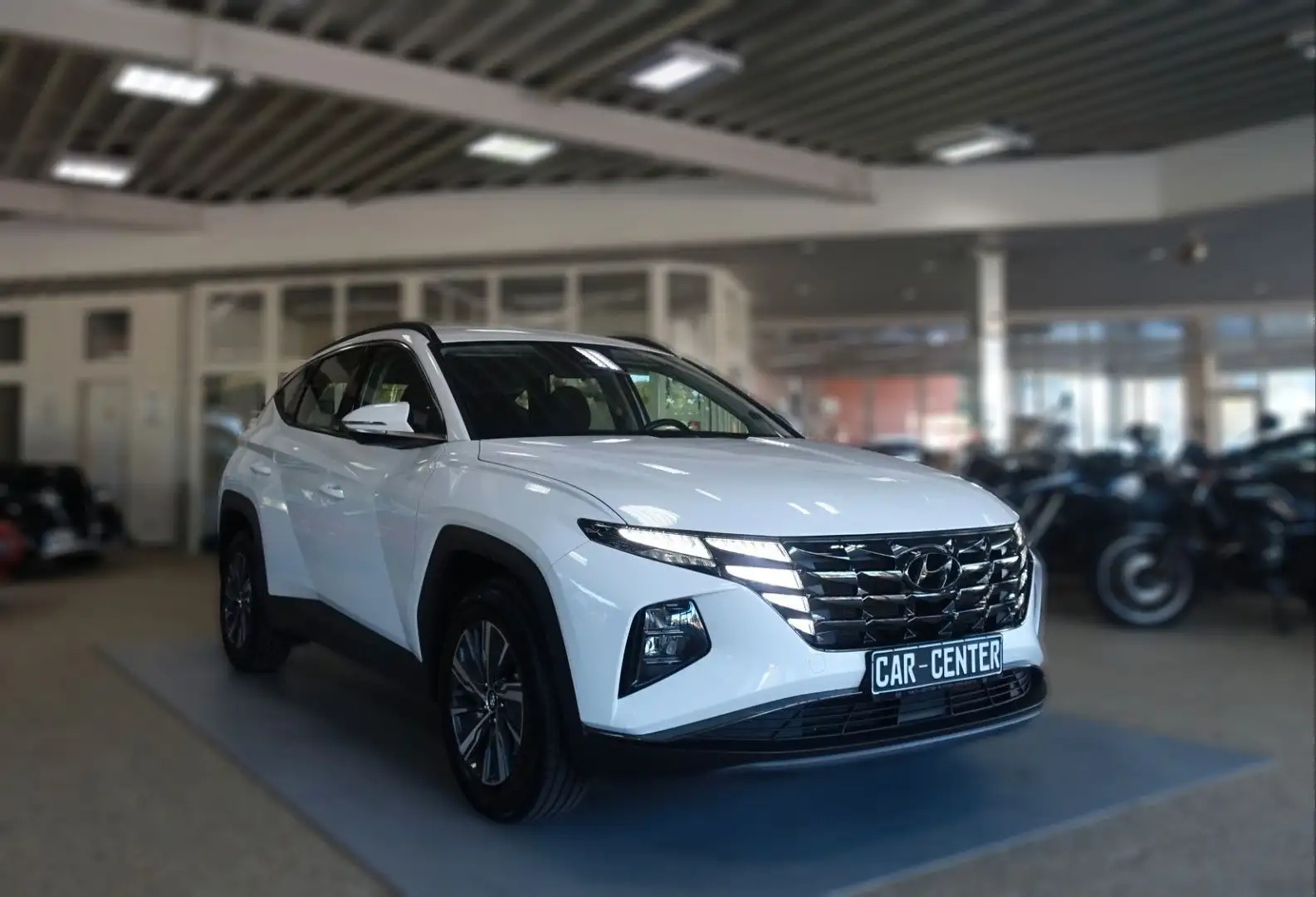 Hyundai TUCSON T-GDI 4WD Autom., NAV LED KAM SHZ LAN Weiß - 1