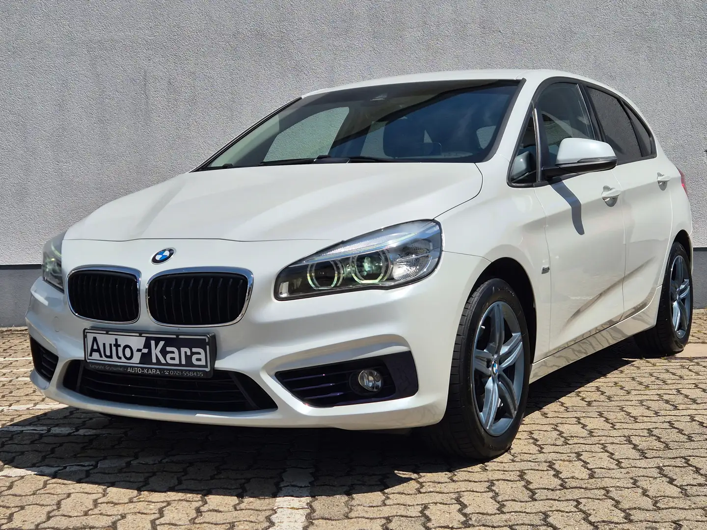 BMW 225 225 i xDrive Sport Line*Navigation*AHK*LED*PDC* Wit - 1