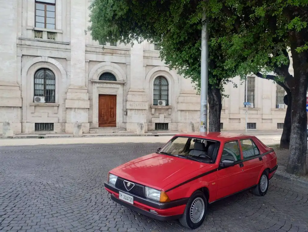 Alfa Romeo 75 1986 из Европы — купить под ключ