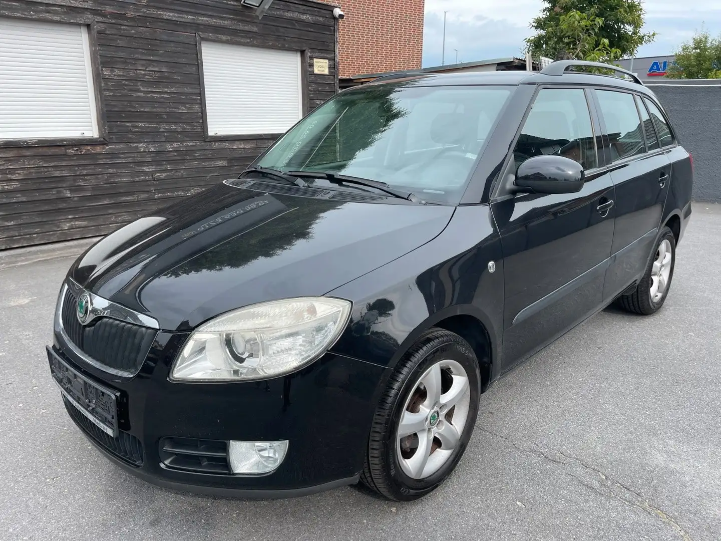 Skoda Fabia Combi Style 1.6 Edition 1HD*SCHHFT*KLIMA*STZHZG* Schwarz - 1