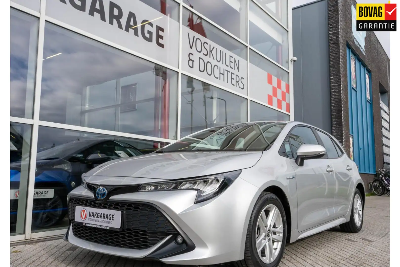 Toyota Corolla 1.8 Hybrid Business | Navigatie | Stoelverwarming Grijs - 1